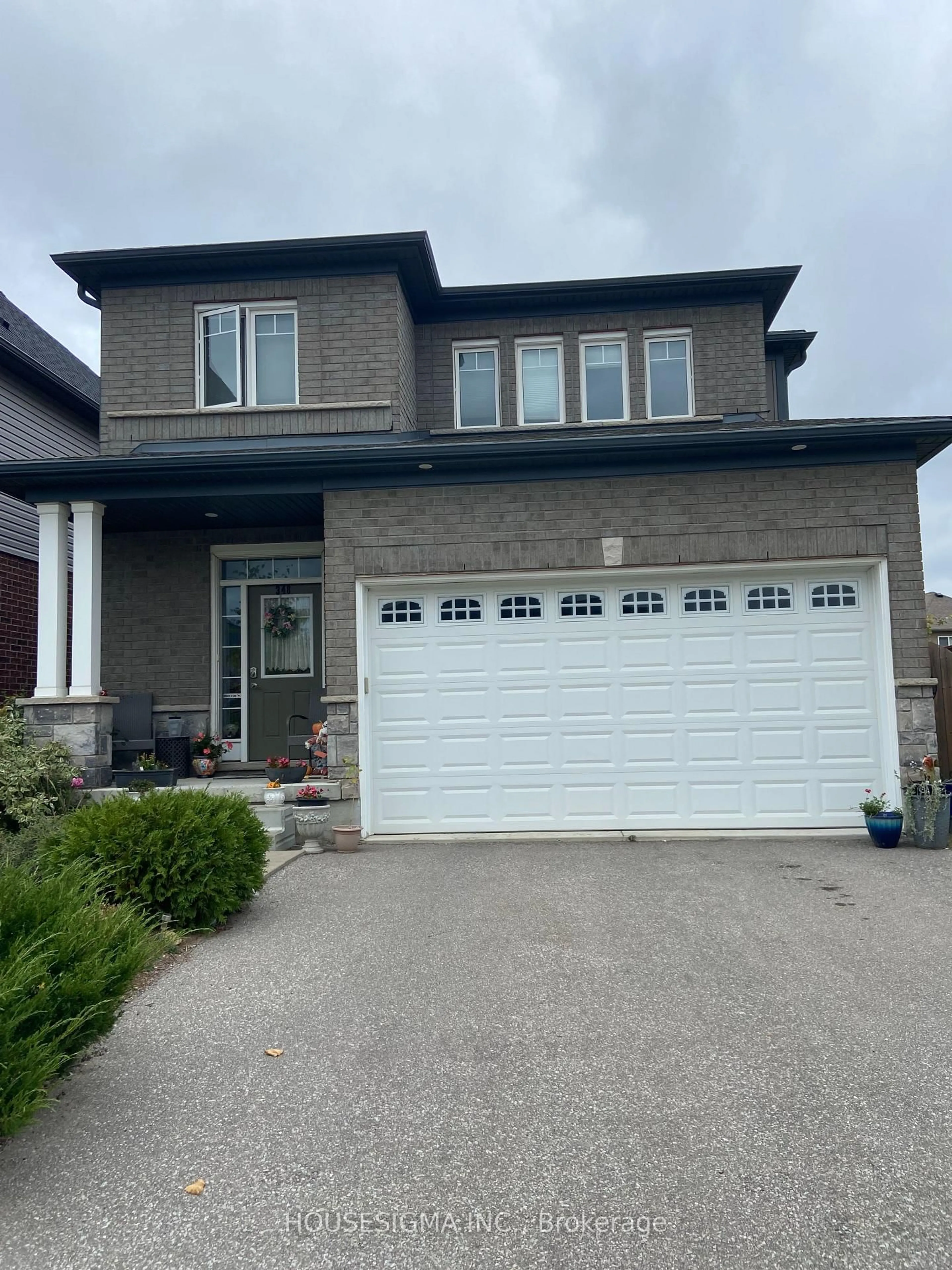 Home with brick exterior material, street for 348 Freure Dr, Cambridge Ontario N1S 0B5