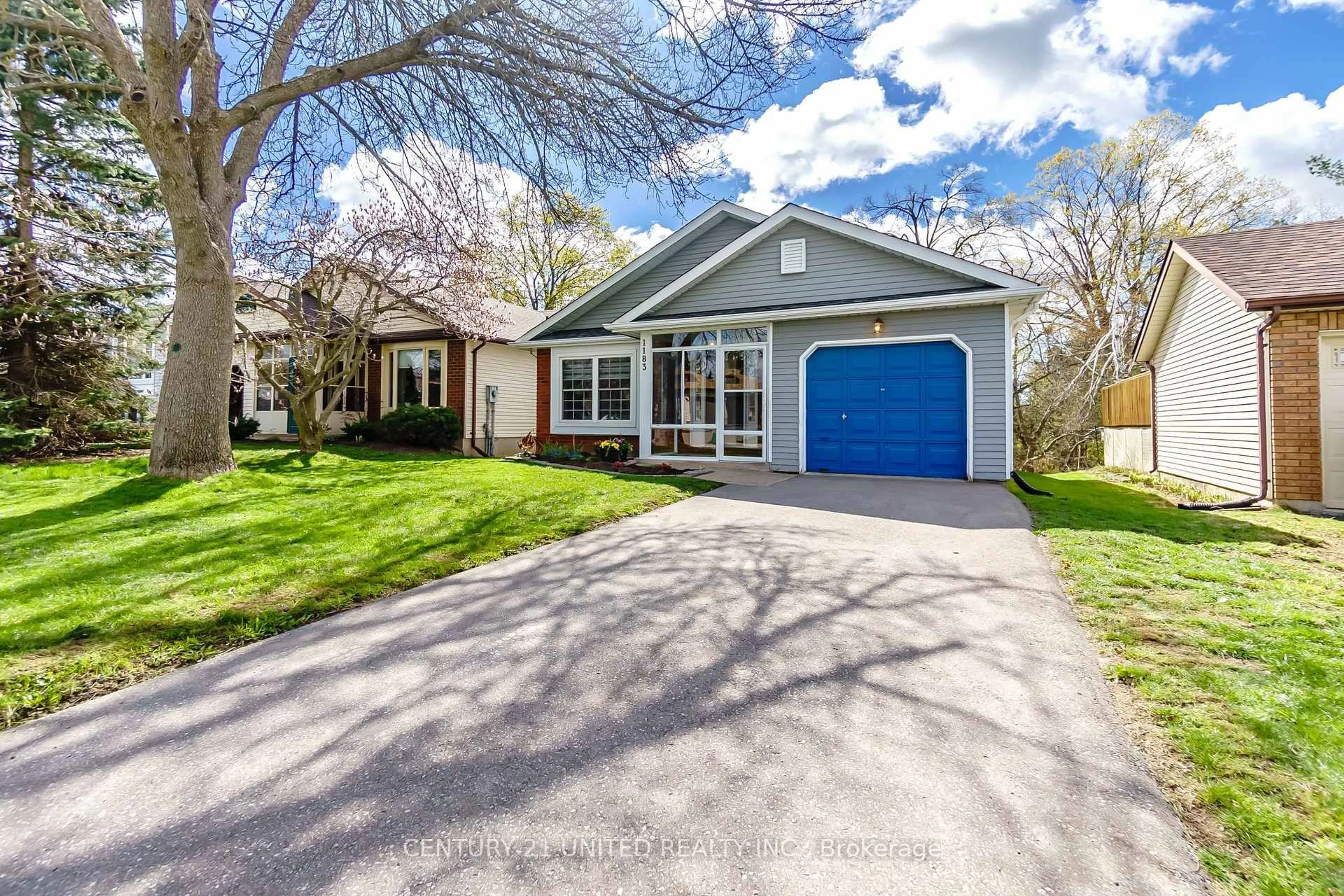 Home with vinyl exterior material, street for 1183 Huntington Circ, Peterborough Ontario K9K 2B9