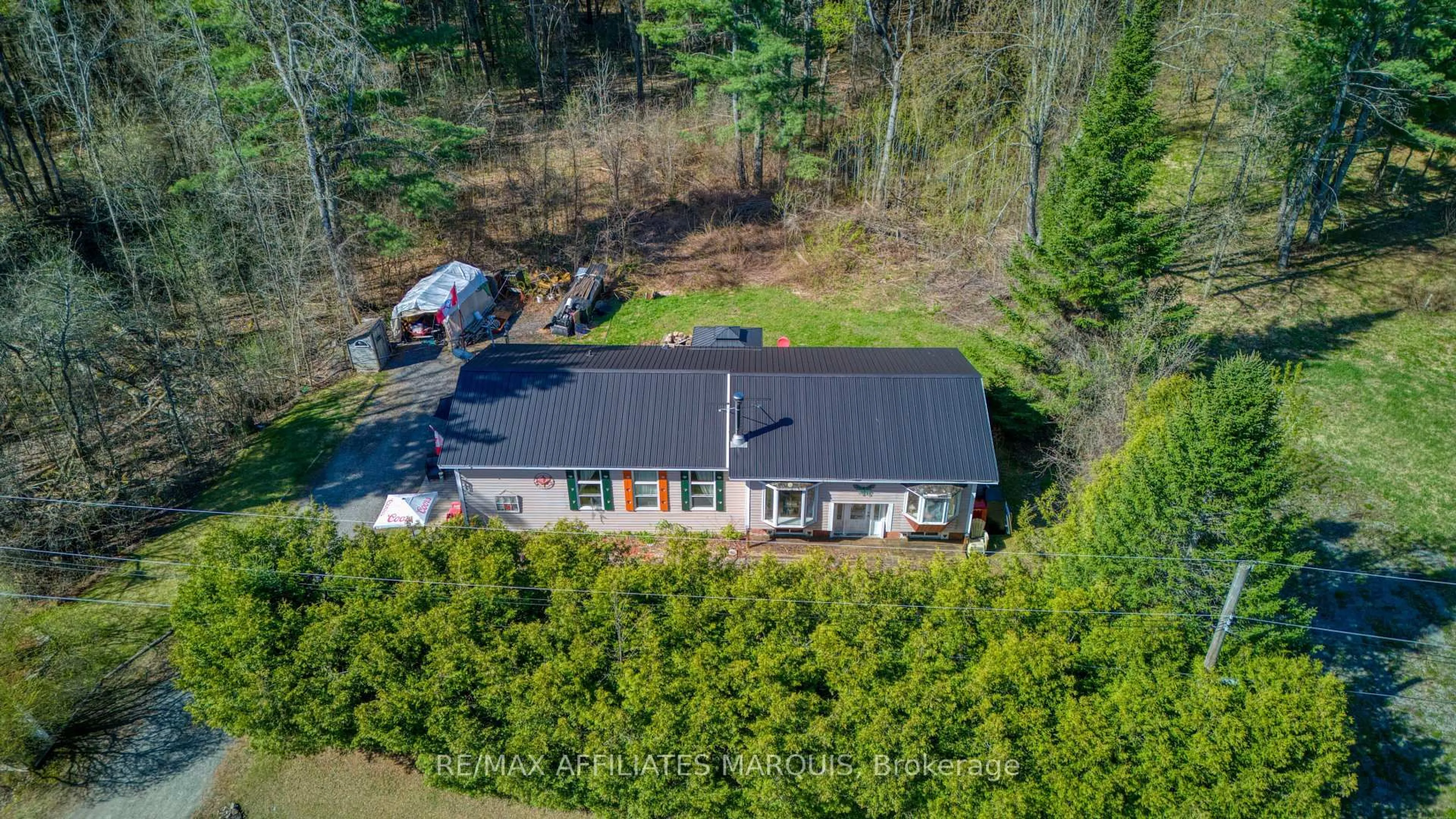 A pic from outside/outdoor area/front of a property/back of a property/a pic from drone, unknown for 641 Harper Rd, Perth Ontario K7H 3C9