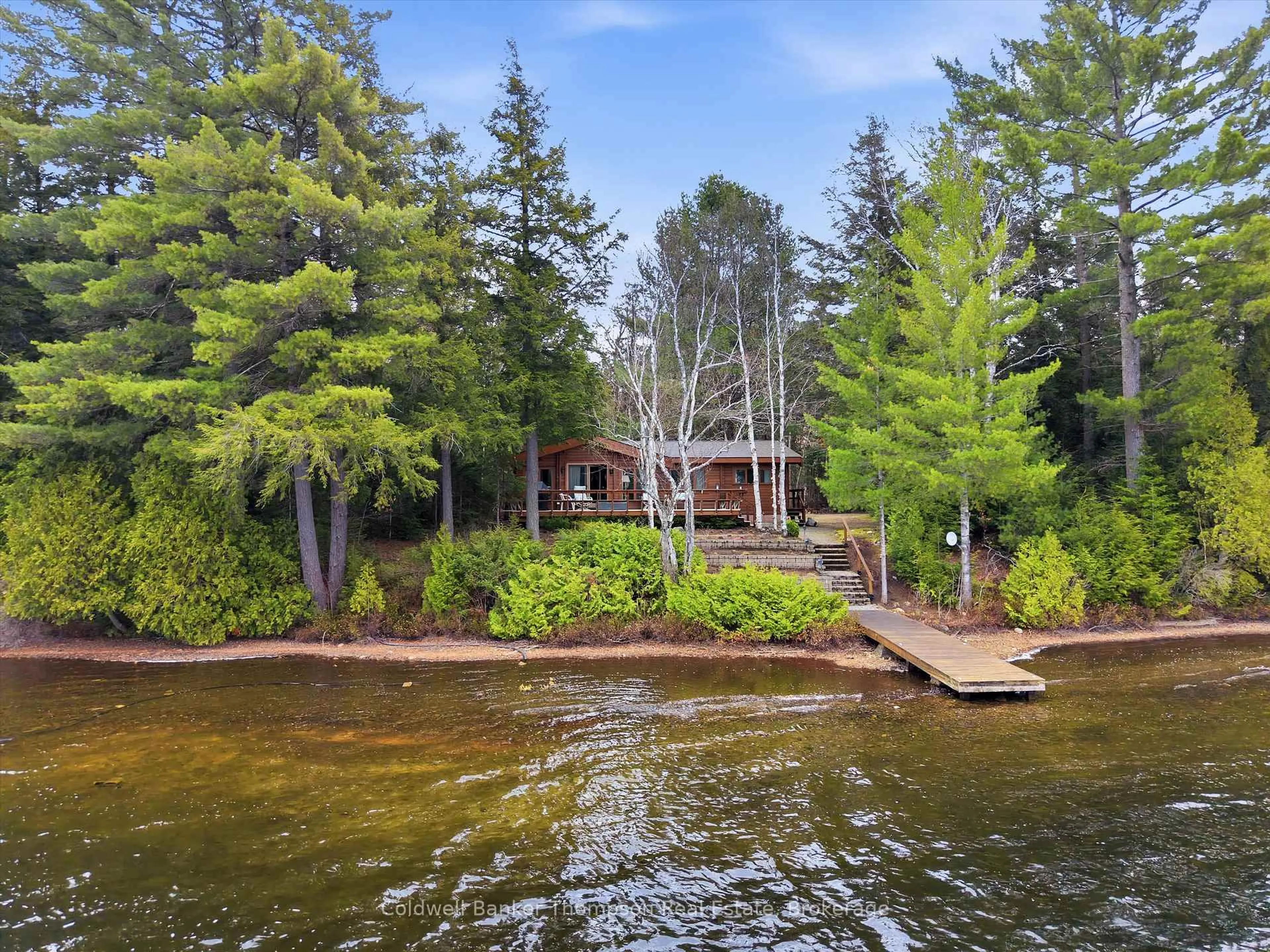 A pic from outside/outdoor area/front of a property/back of a property/a pic from drone, water/lake/river/ocean view for 722 Grass Lake Rd, Kearney Ontario P0A 1M0