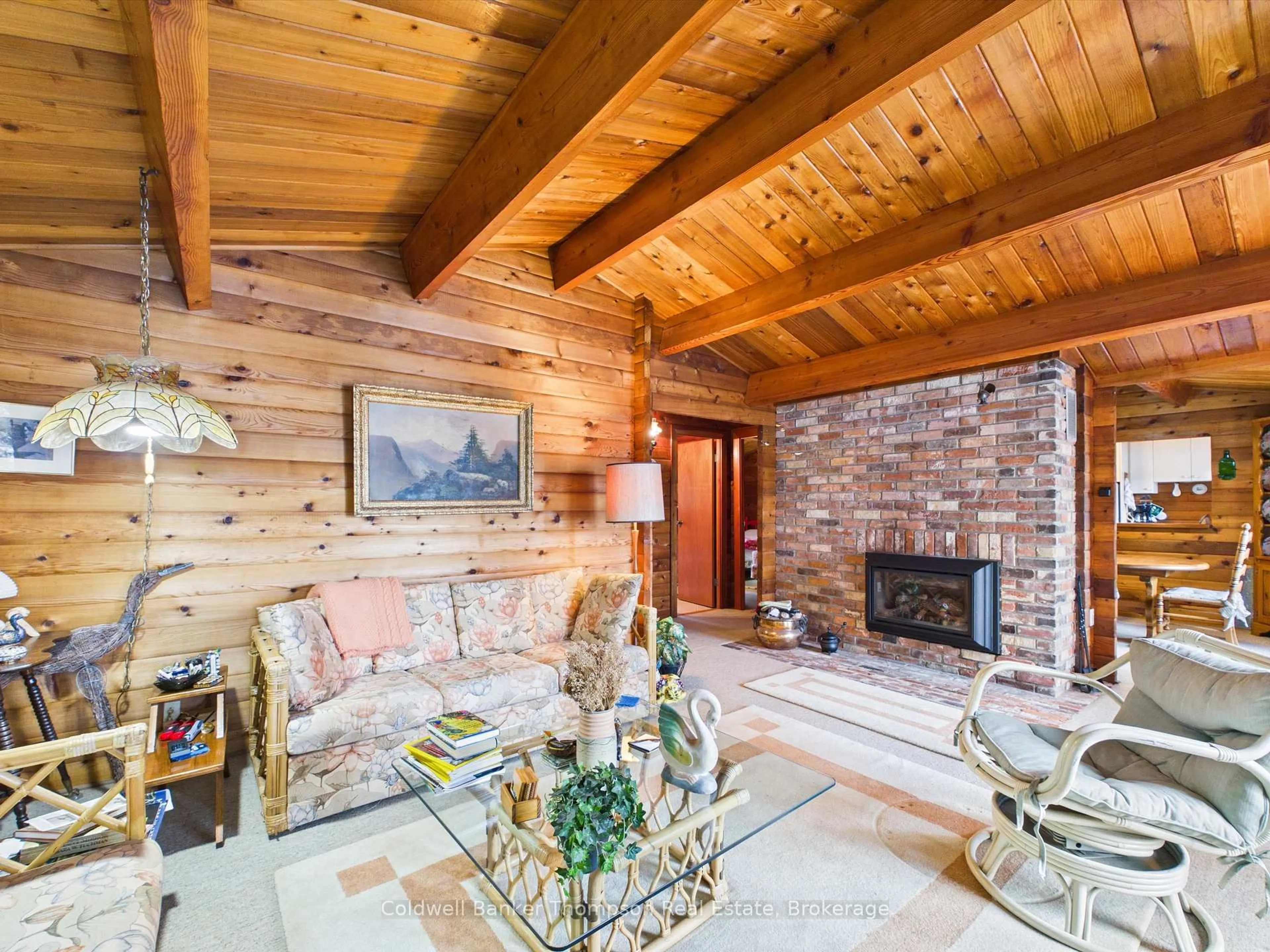Living room with furniture, wood/laminate floor for 722 Grass Lake Rd, Kearney Ontario P0A 1M0