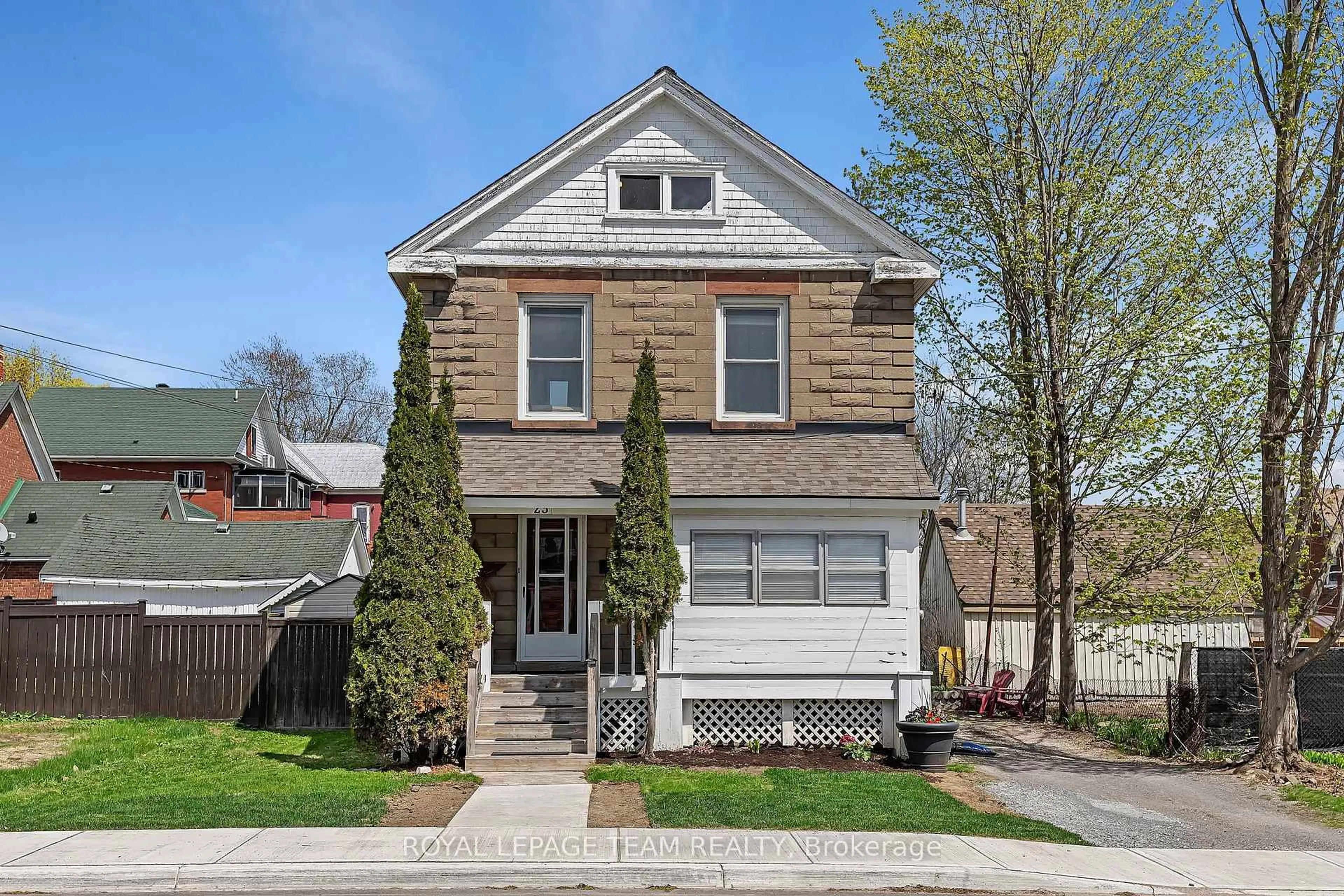 Home with brick exterior material, street for 23 George St, Smiths Falls Ontario K7A 1Y3
