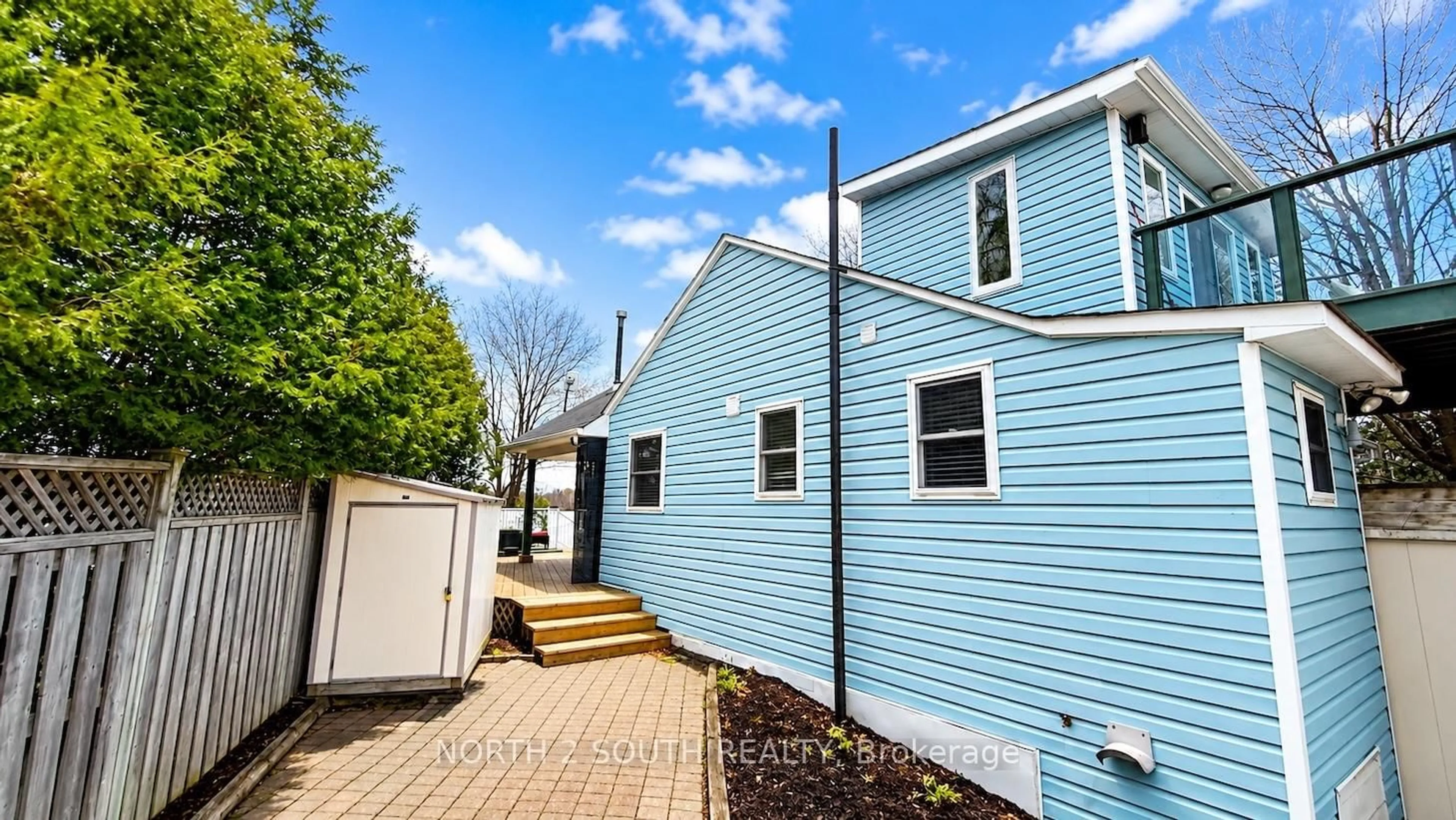 Home with vinyl exterior material, street for 123 Fells Point Rd, Kawartha Lakes Ontario K0M 1N0
