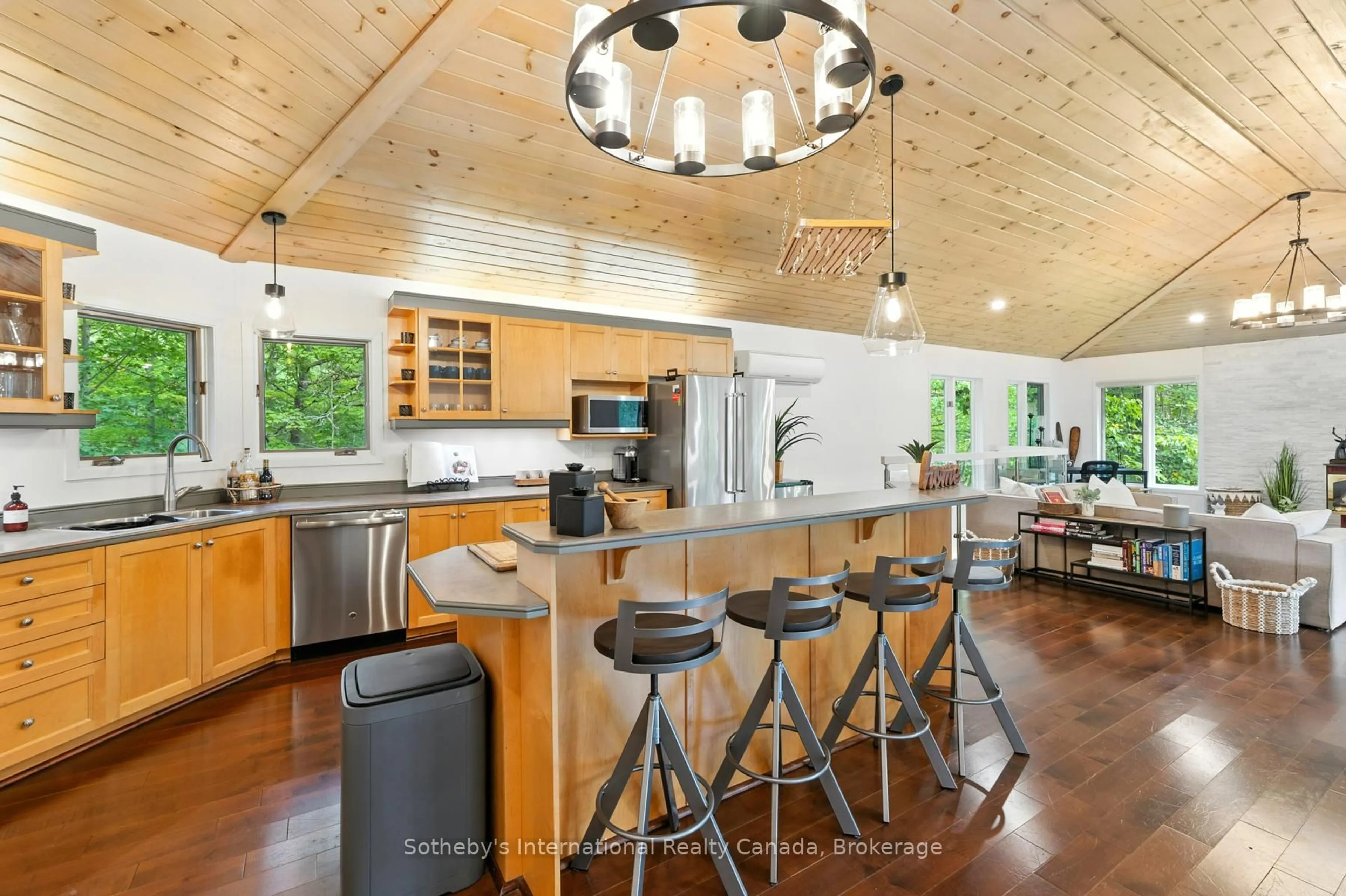 Open concept kitchen, wood/laminate floor for 1060 North Kahshe Lake Rd, Gravenhurst Ontario P0E 1G0