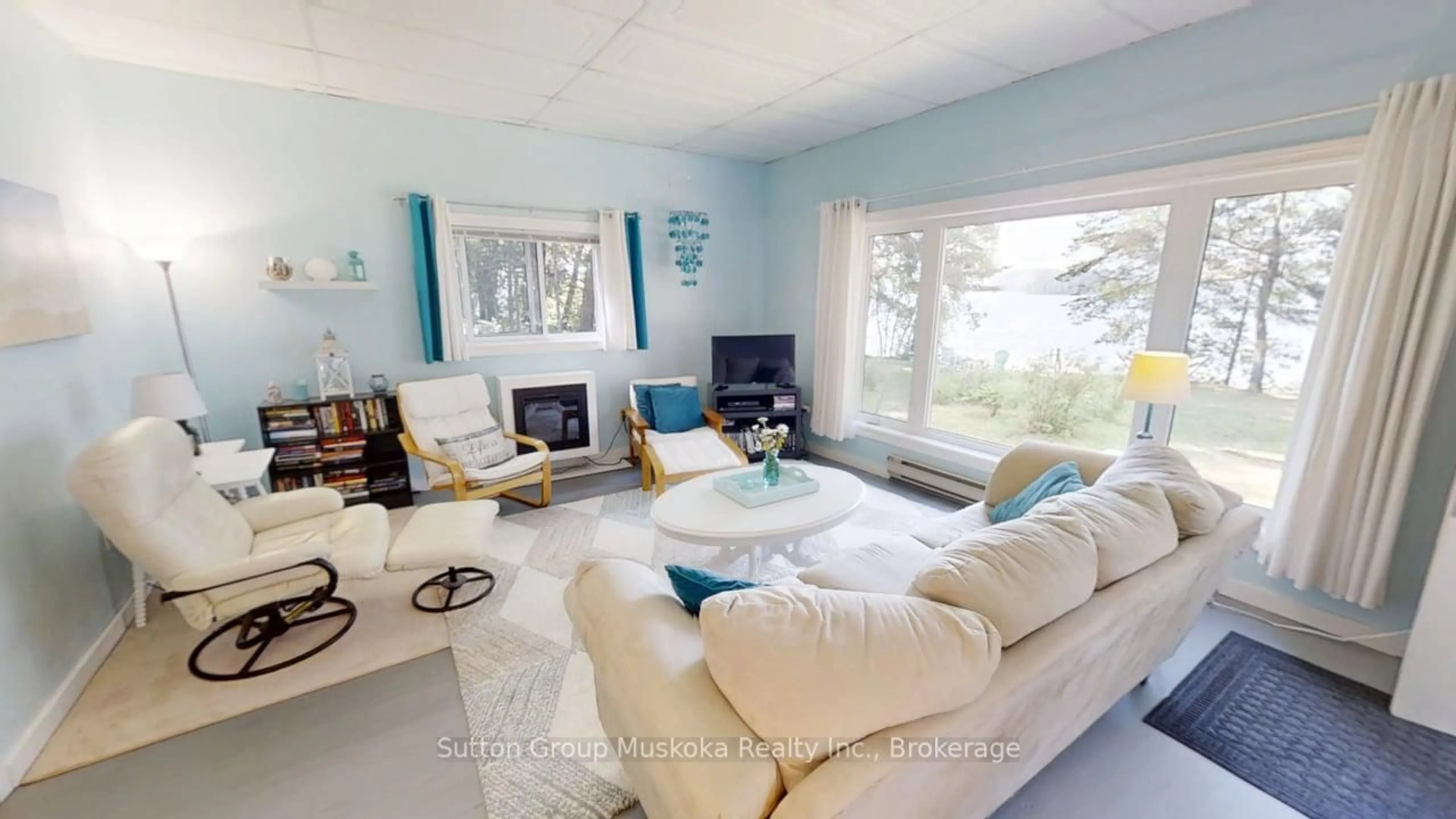Living room with furniture, unknown for 1060 Seabreeze # 6 Rd, Lake of Bays Ontario P0A 1H0