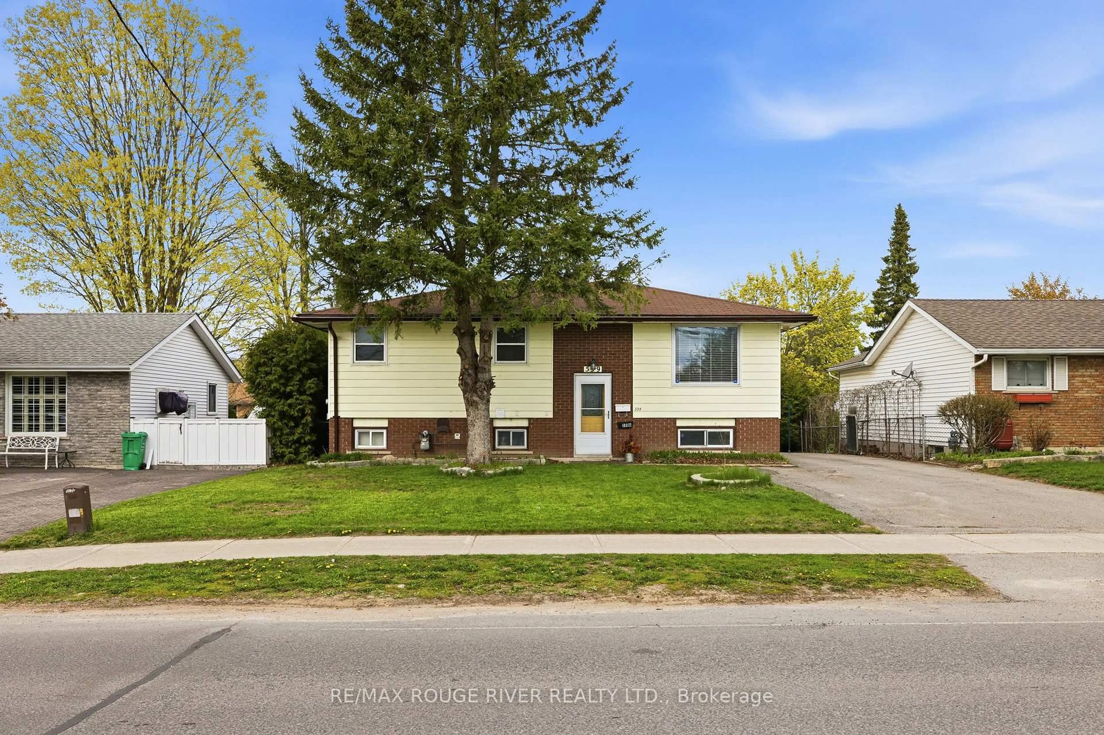 Home with vinyl exterior material, street for 599 Otonabee Dr, Peterborough Ontario K9J 7X8