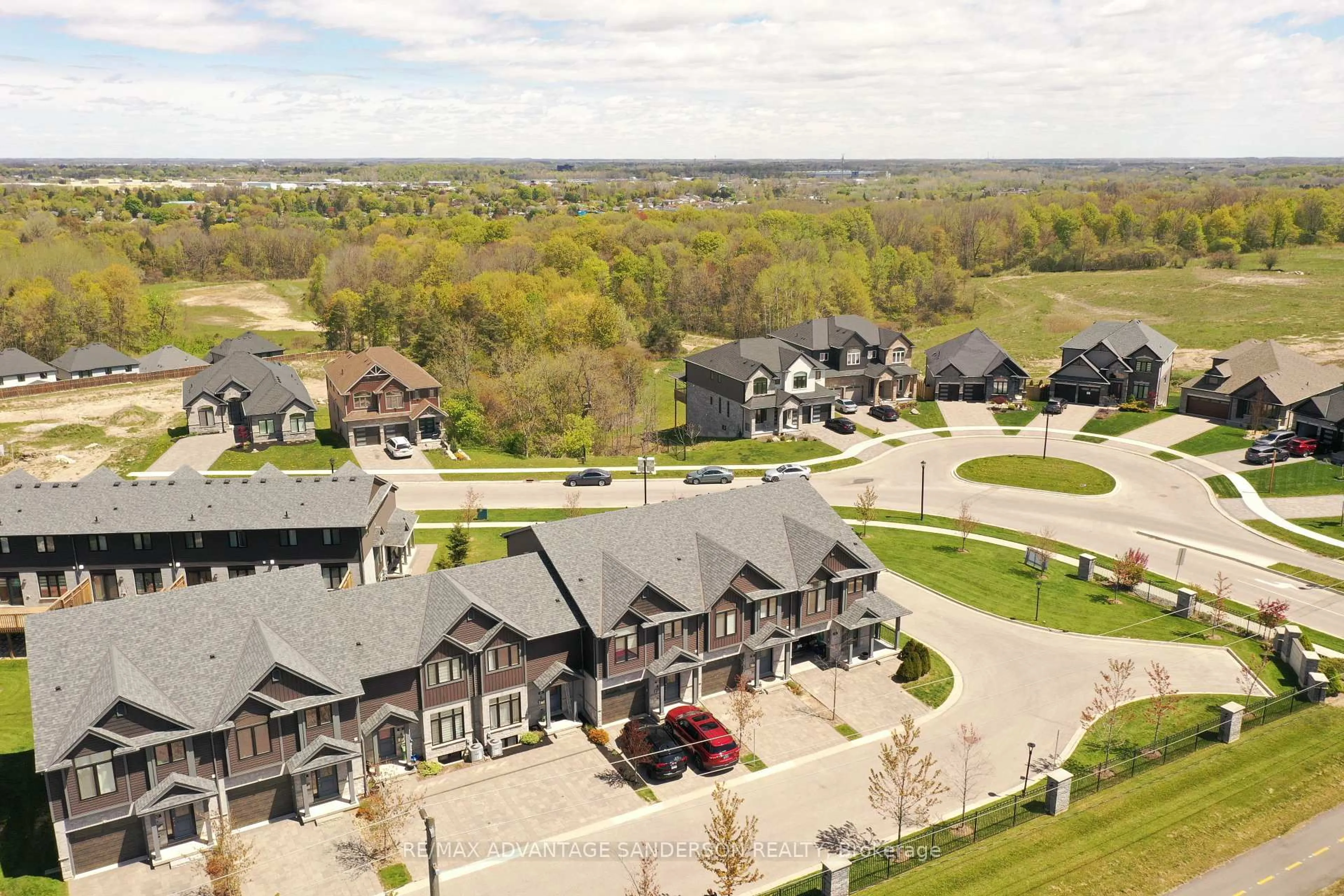 A pic from outside/outdoor area/front of a property/back of a property/a pic from drone, unknown for 1110 Meadowlark Rdge #48, London South Ontario N6M 0H4