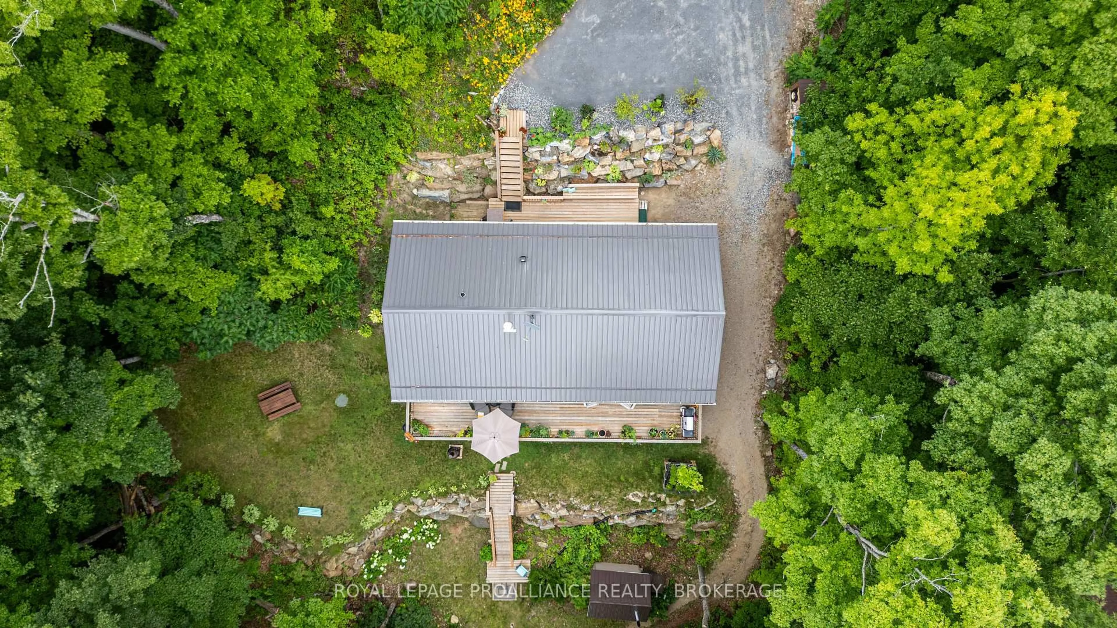 A pic from outside/outdoor area/front of a property/back of a property/a pic from drone, building for 1099 Almost Lane, Ardoch Ontario K0H 1C0