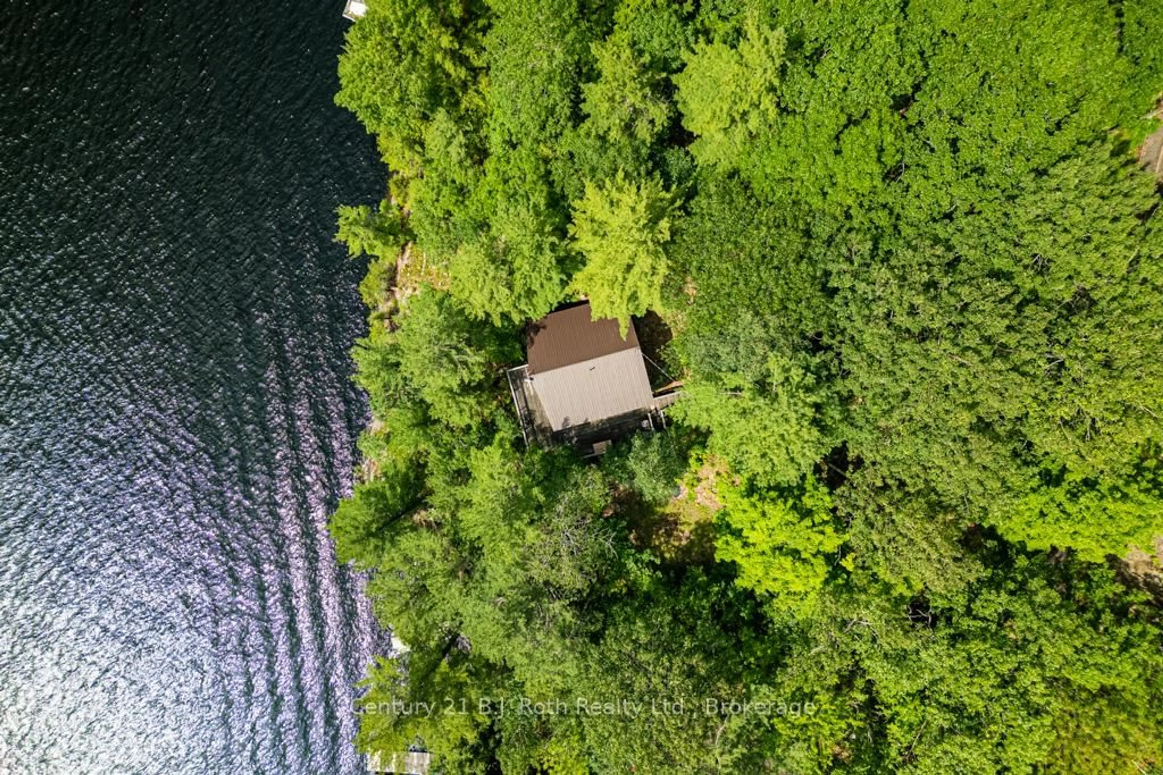 A pic from outside/outdoor area/front of a property/back of a property/a pic from drone, water/lake/river/ocean view for 1033 Bayview Point Rd, Lake of Bays Ontario P0A 1H0