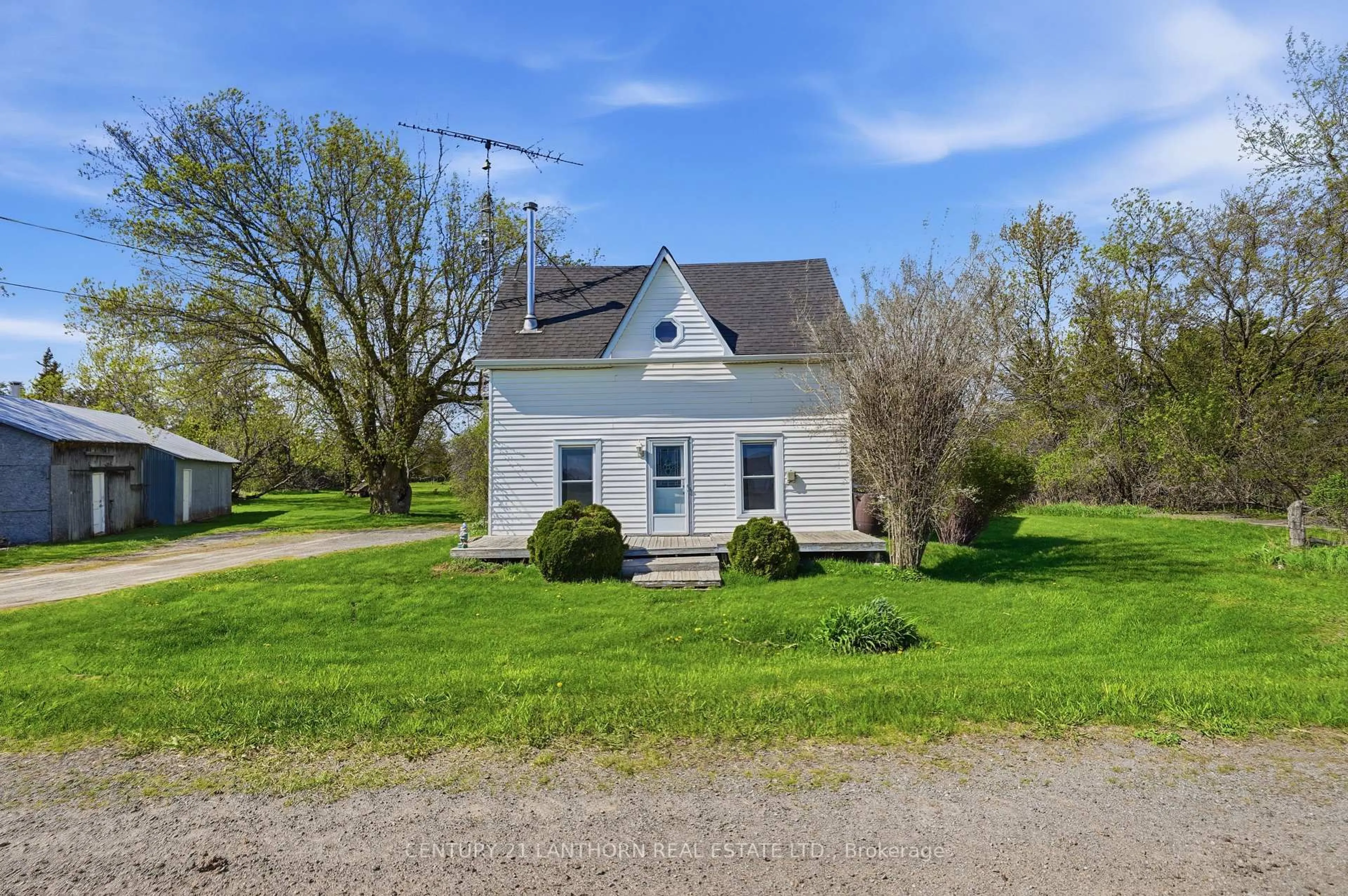 A pic from outside/outdoor area/front of a property/back of a property/a pic from drone, street for 1229 County 7 Rd, Prince Edward County Ontario K0K 2T0
