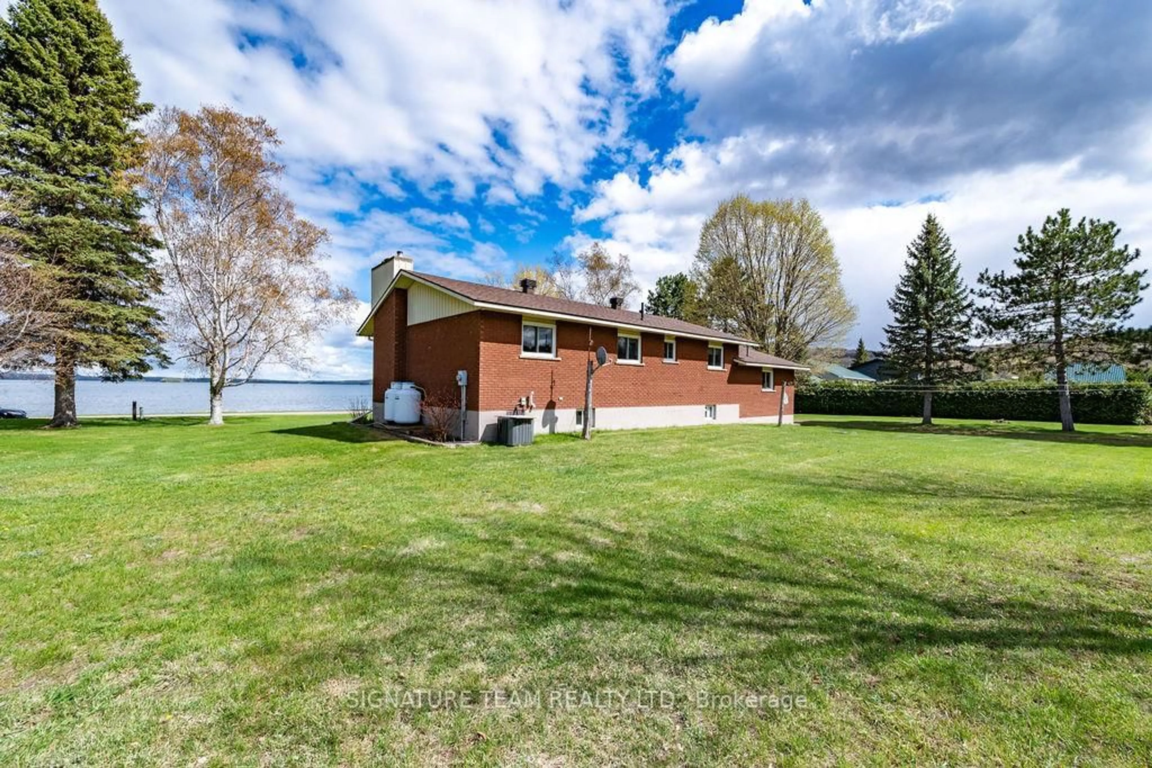 A pic from outside/outdoor area/front of a property/back of a property/a pic from drone, water/lake/river/ocean view for 1039 Lake Clear Rd, Eganville Ontario K0J 1T0