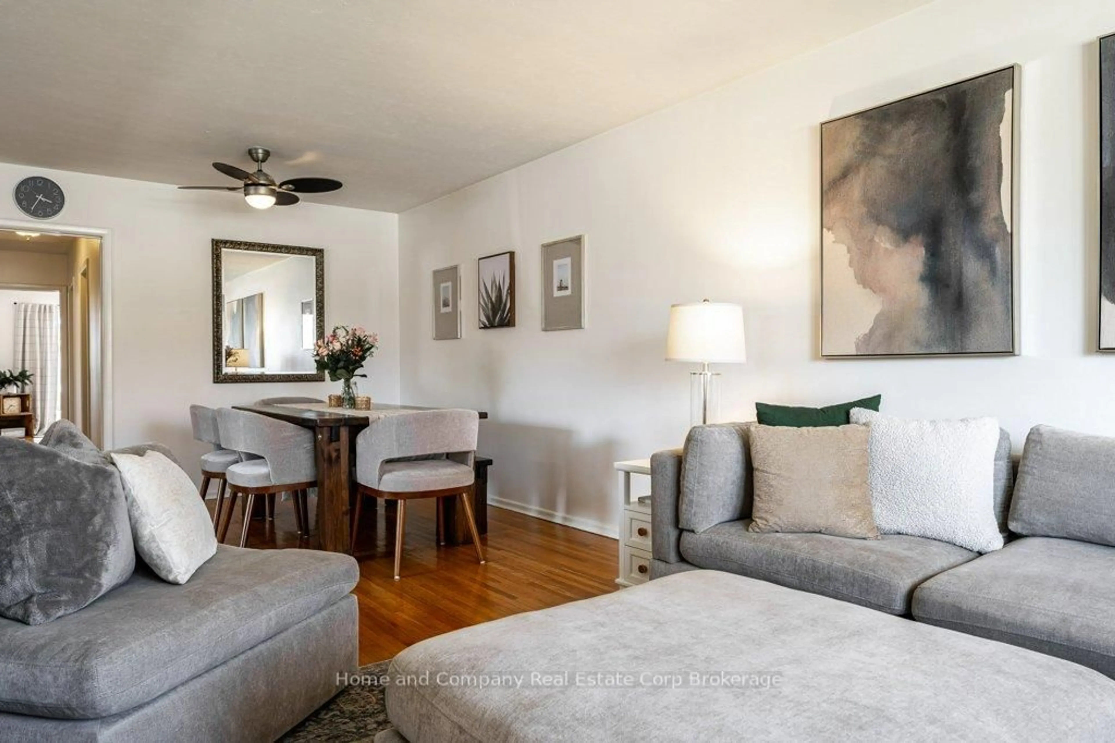 Living room with furniture, wood/laminate floor for 228 Redford Cres, Stratford Ontario N5A 1P2