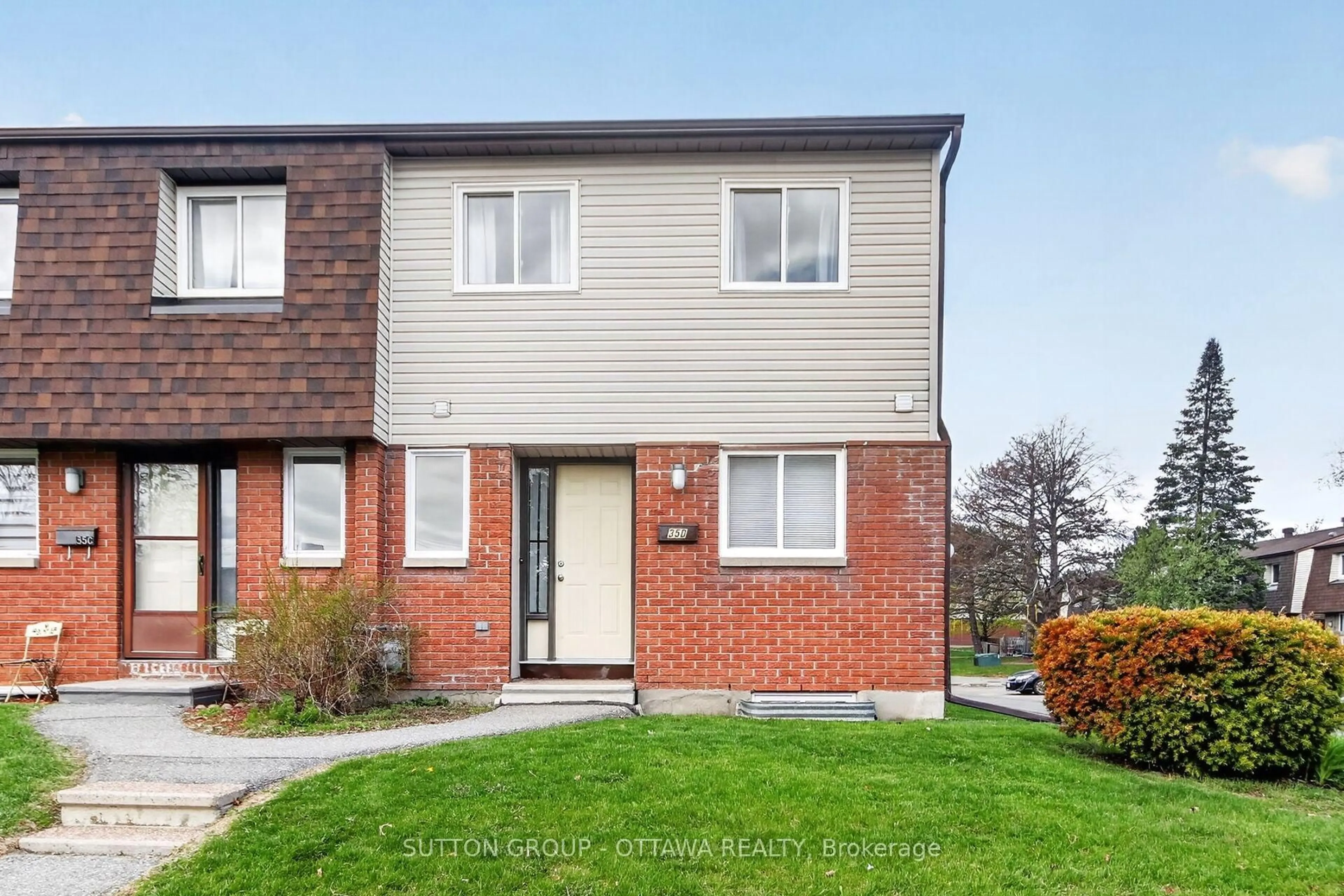 Home with brick exterior material, street for 35D Woodvale Green #79, Ottawa Ontario K2G 4H3