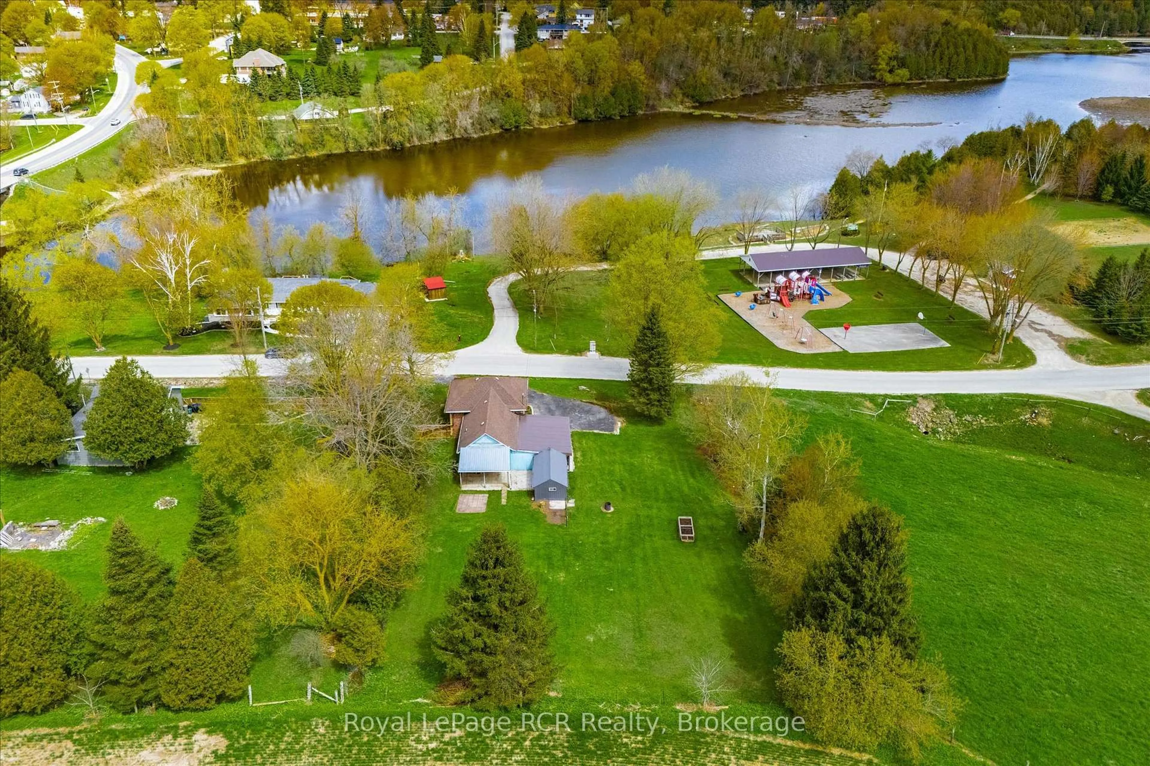 A pic from outside/outdoor area/front of a property/back of a property/a pic from drone, water/lake/river/ocean view for 160 Murphy St, Wellington North Ontario N0G 2L3