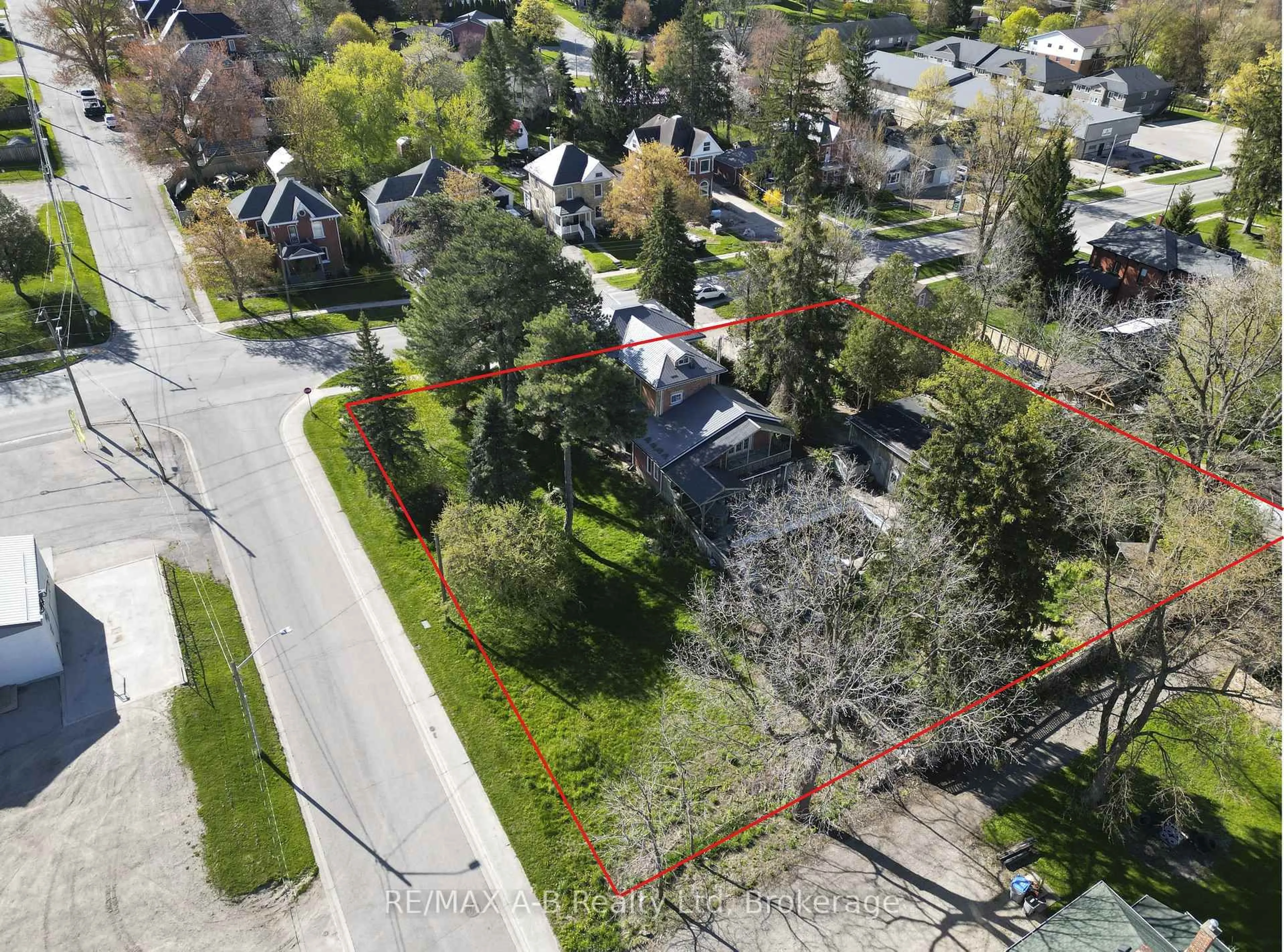 A pic from outside/outdoor area/front of a property/back of a property/a pic from drone, street for 46 Main St, Perth East Ontario N0K 1M0