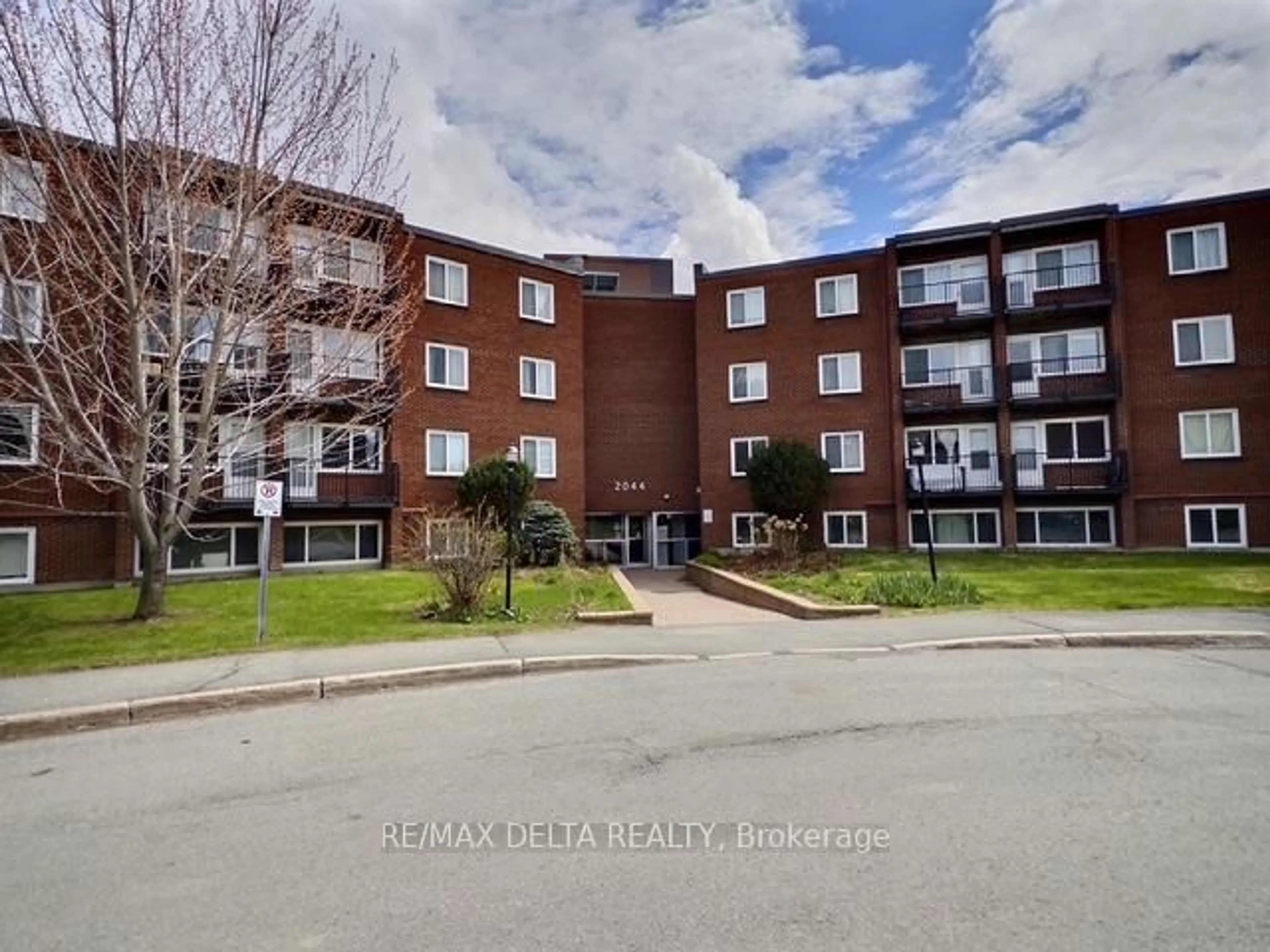 A pic from outside/outdoor area/front of a property/back of a property/a pic from drone, unknown for 2044 Arrowsmith Dr #105B, Ottawa Ontario K1J 7V8