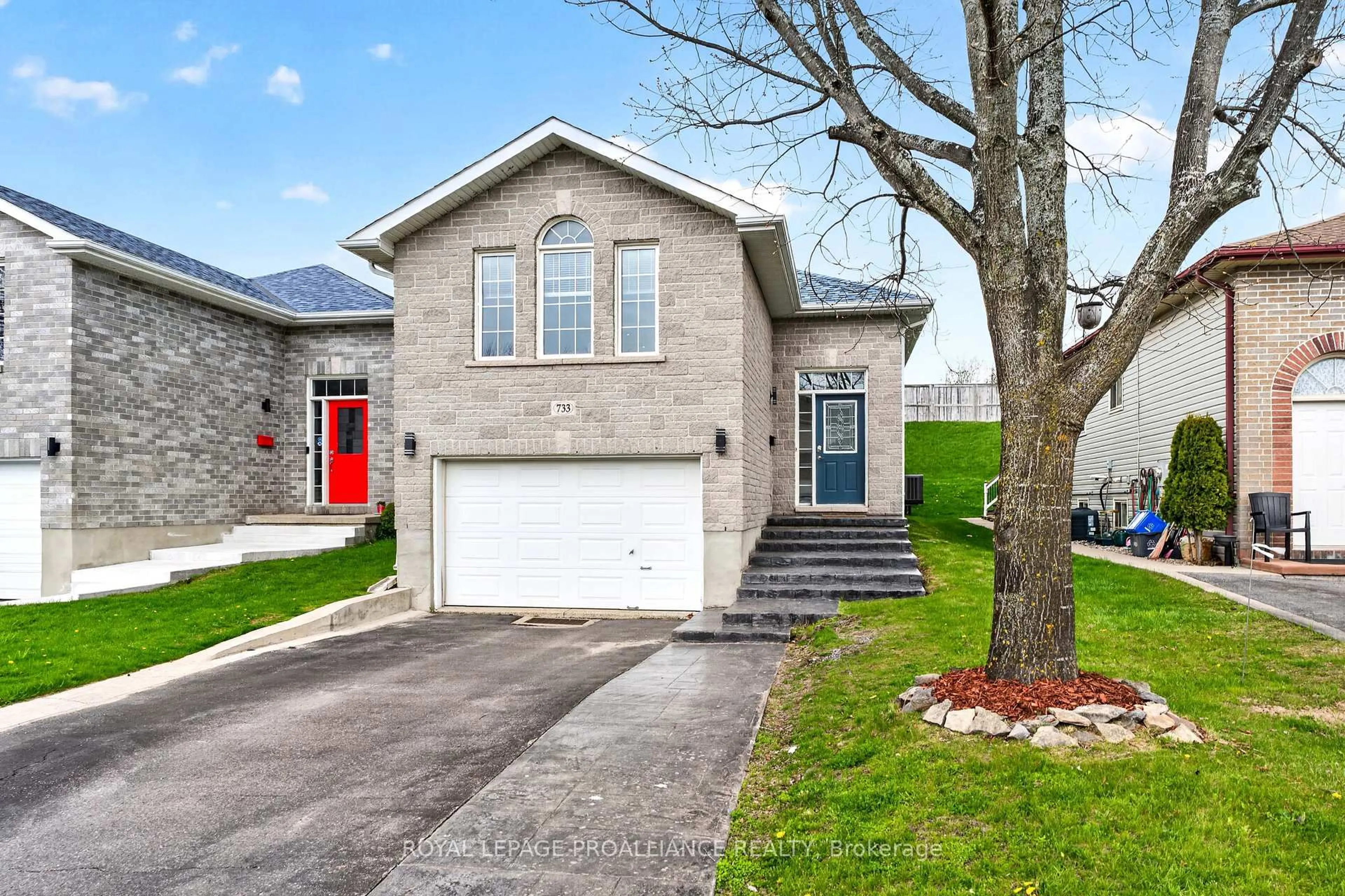 Home with brick exterior material, street for 733 Tanner Dr, Kingston Ontario K7M 8Y2