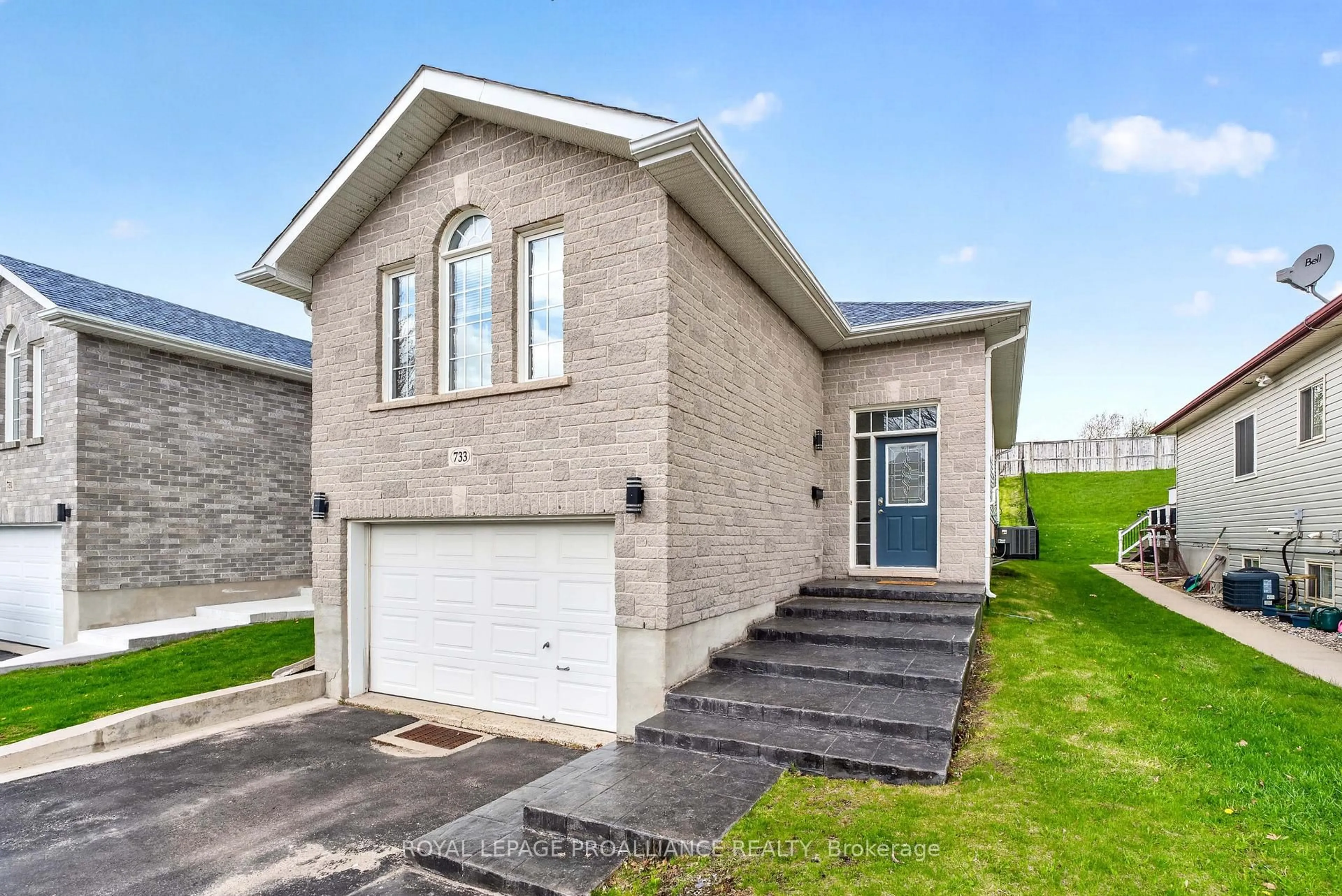 Home with brick exterior material, street for 733 Tanner Dr, Kingston Ontario K7M 8Y2