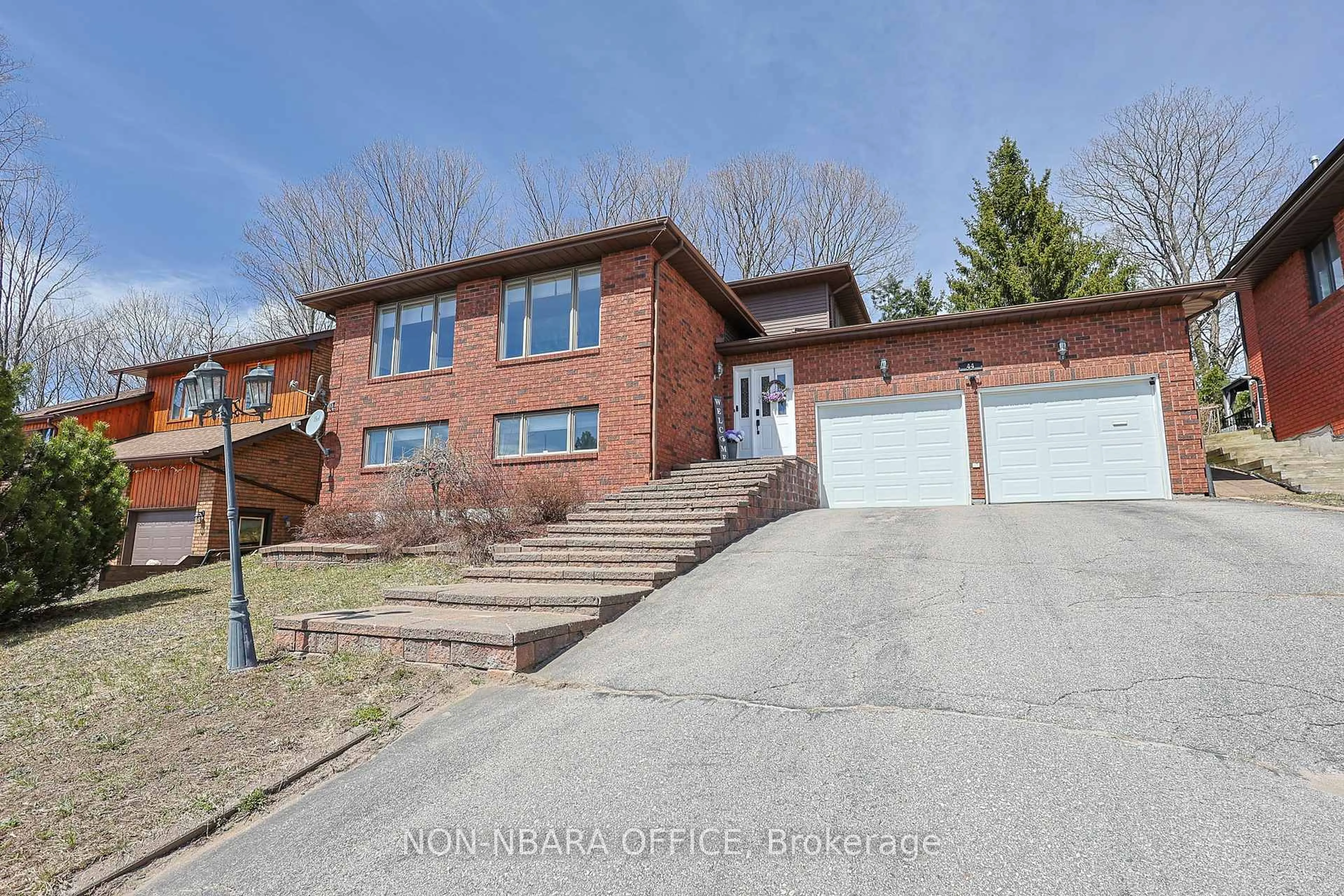 Home with brick exterior material, street for 44 Ellendale Dr, North Bay Ontario P1B 8X6
