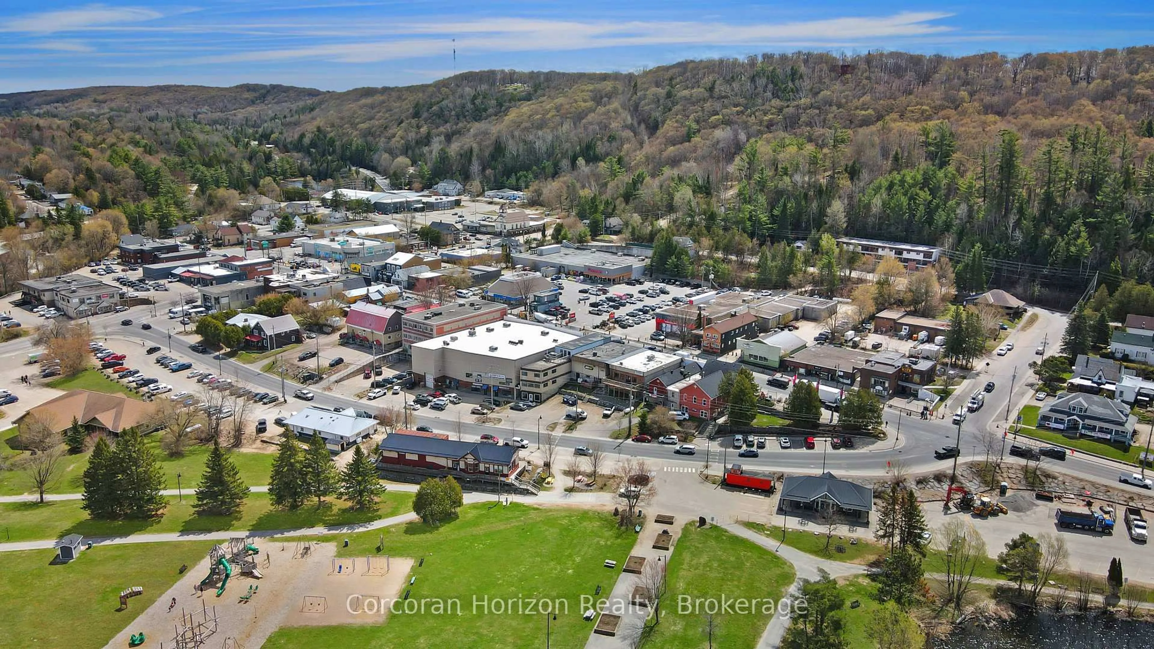 A pic from outside/outdoor area/front of a property/back of a property/a pic from drone, mountain view for 1 Park St #105, Dysart et al Ontario K0M 1S0