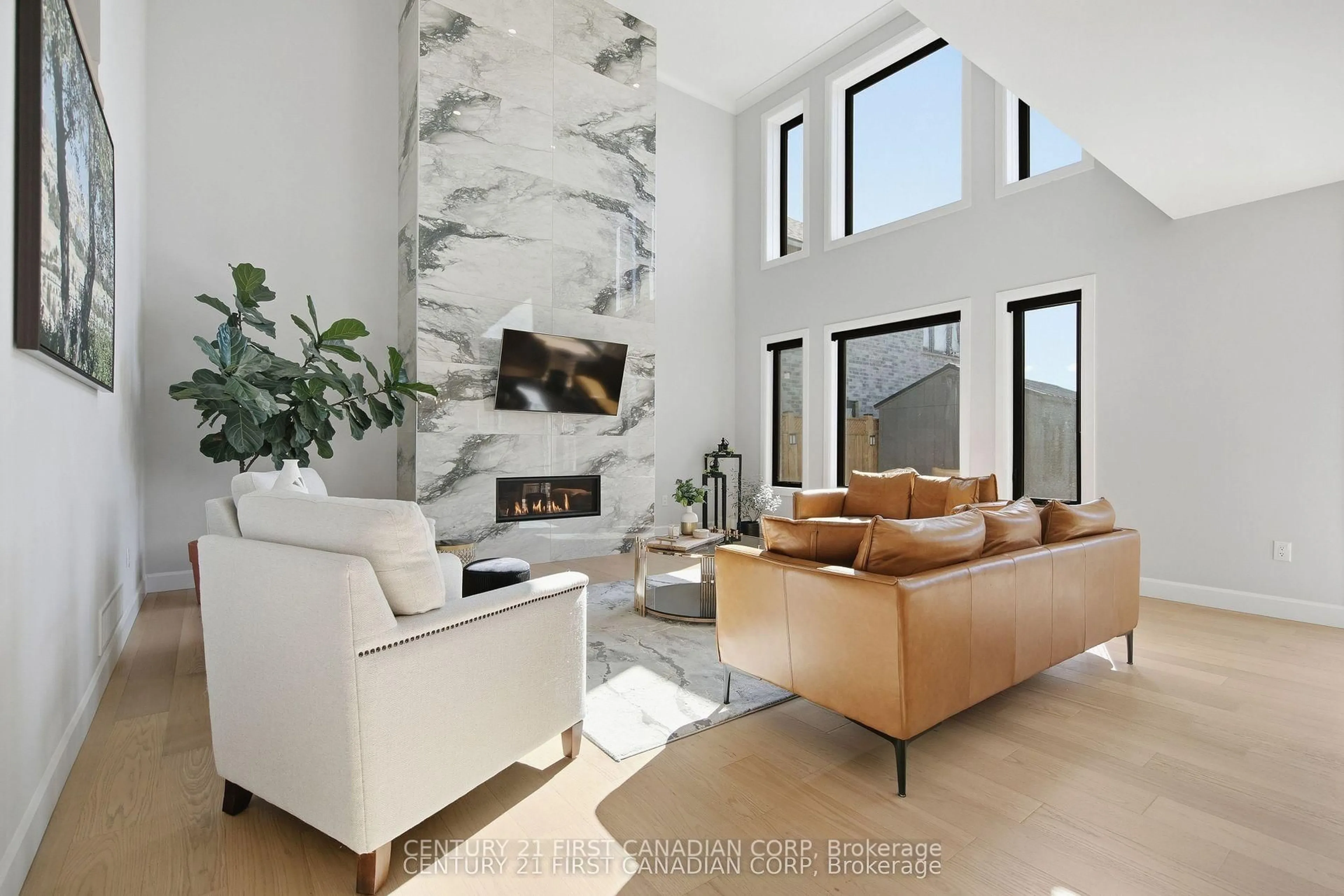 Living room with furniture, ceramic/tile floor for 7129 Silver Creek Circ, London South Ontario N6P 0G9