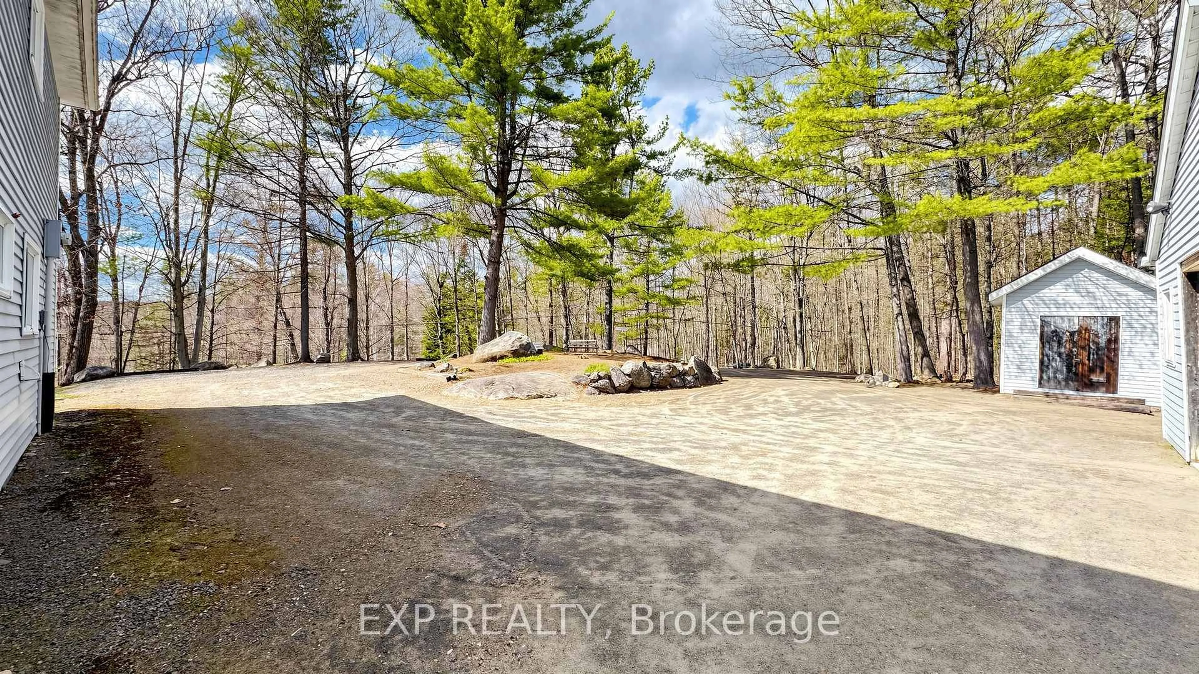 A pic from outside/outdoor area/front of a property/back of a property/a pic from drone, forest/trees view for 3711 Brunel Rd, Lake of Bays Ontario P0B 1A0