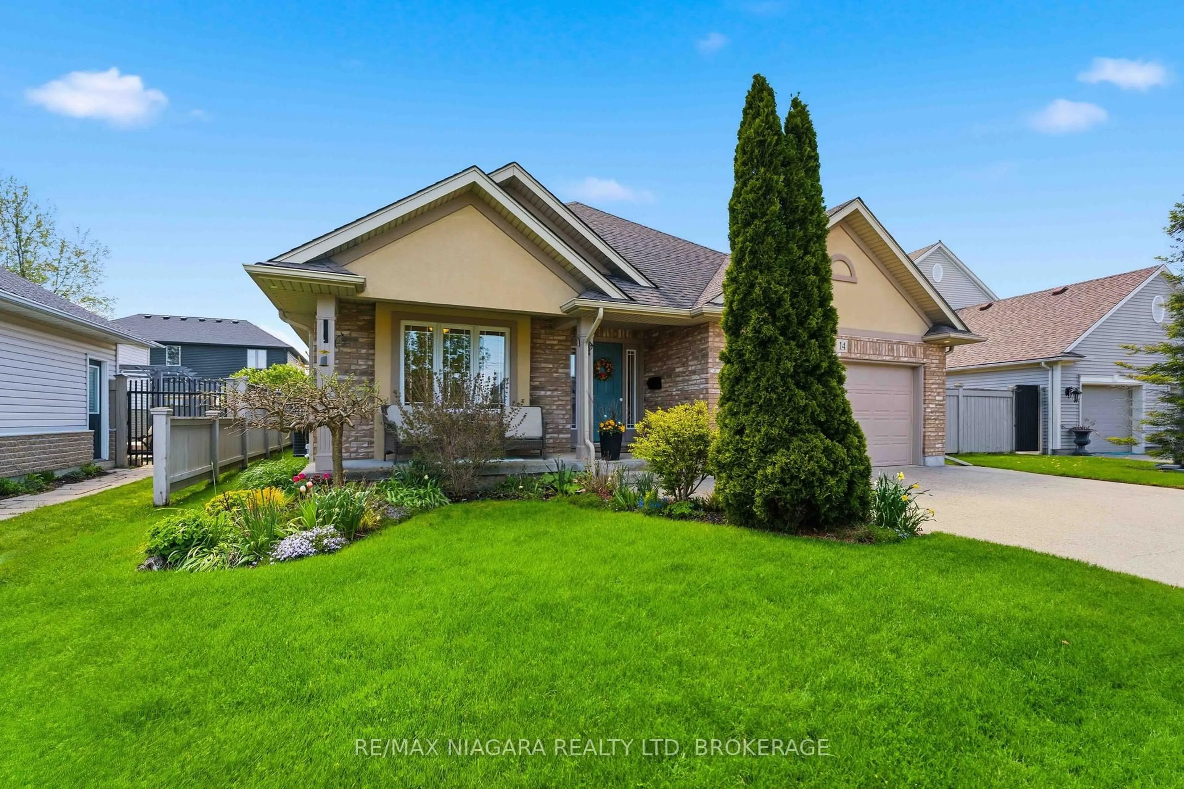 Home with brick exterior material, street for 14 Nicholas Dr, St. Catharines Ontario L2S 4C2