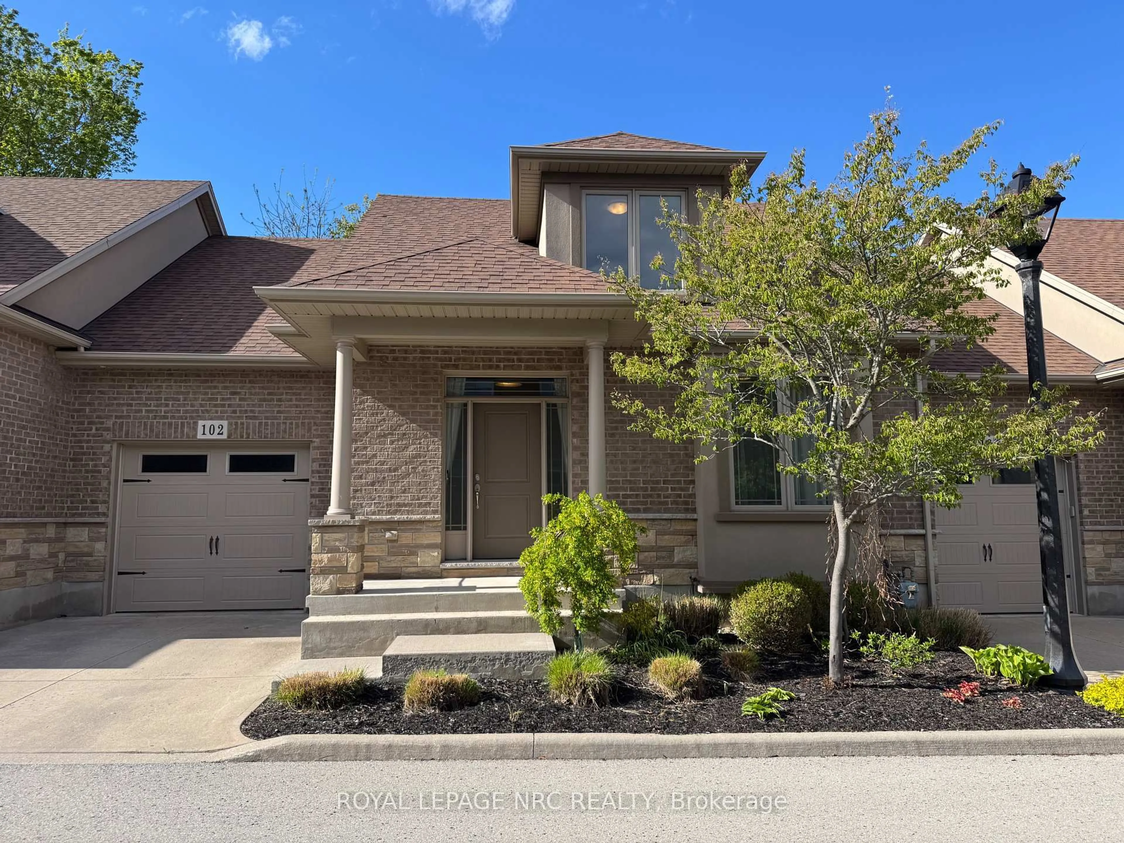 Home with brick exterior material, street for 6186 Dorchester Rd #2, Niagara Falls Ontario L2G 5T2