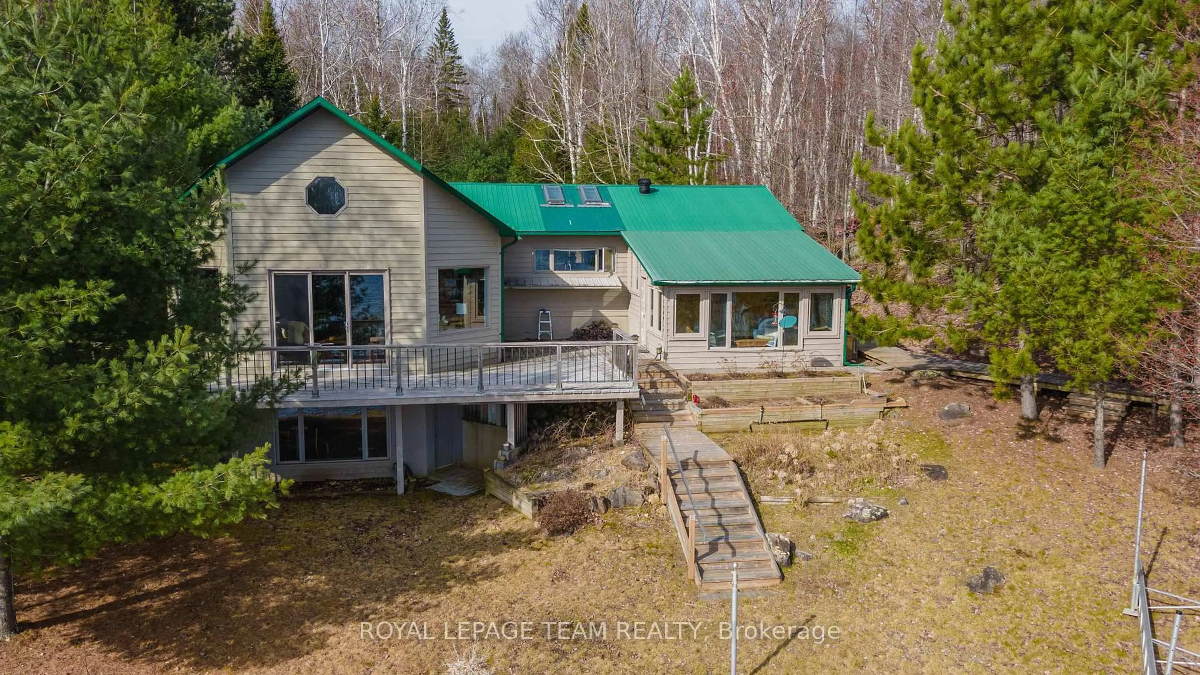 A pic from outside/outdoor area/front of a property/back of a property/a pic from drone, building for 36 Whites Rd, South Algonquin Ontario K0J 1B0