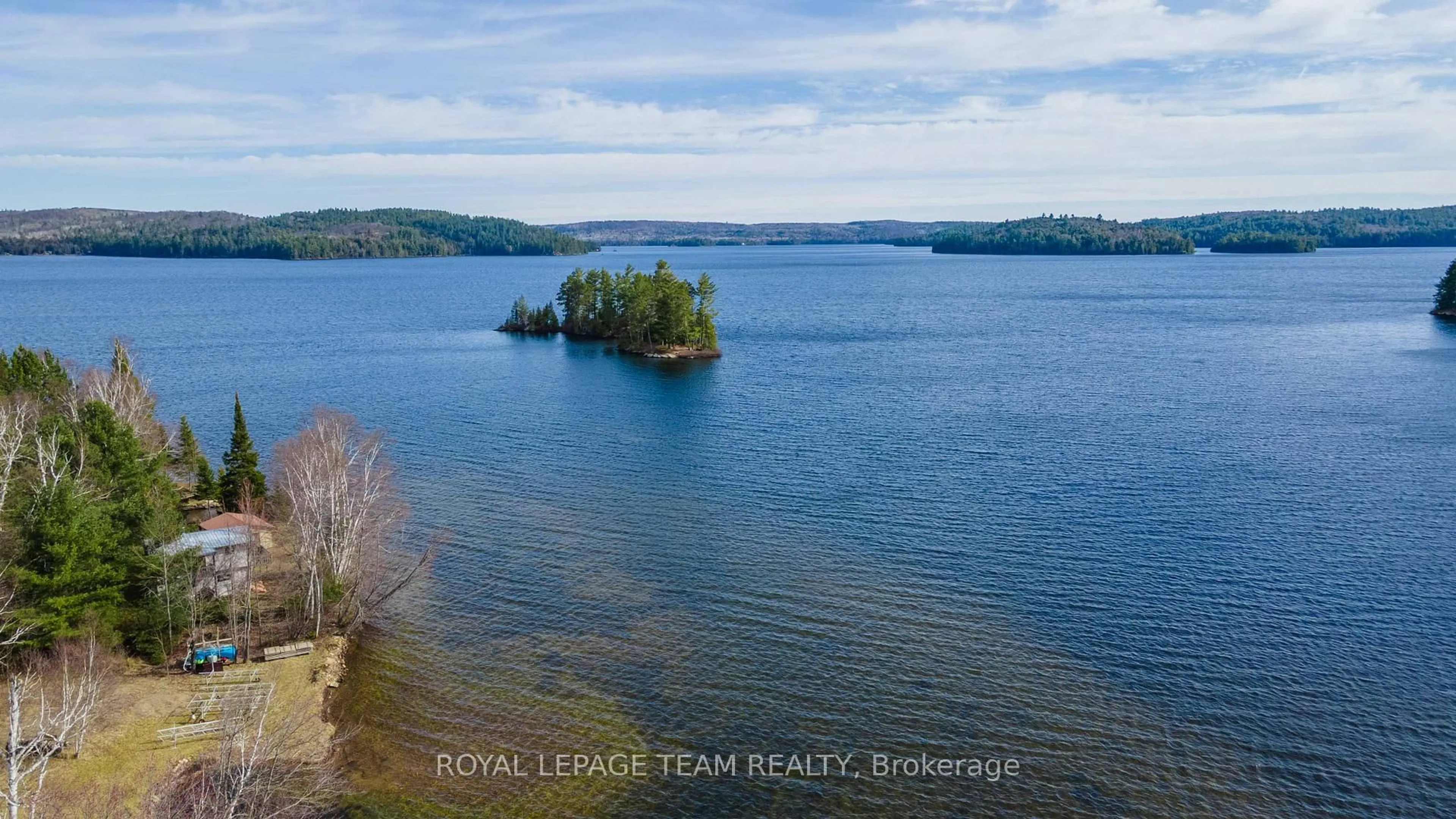 A pic from outside/outdoor area/front of a property/back of a property/a pic from drone, water/lake/river/ocean view for 36 Whites Rd, South Algonquin Ontario K0J 1B0