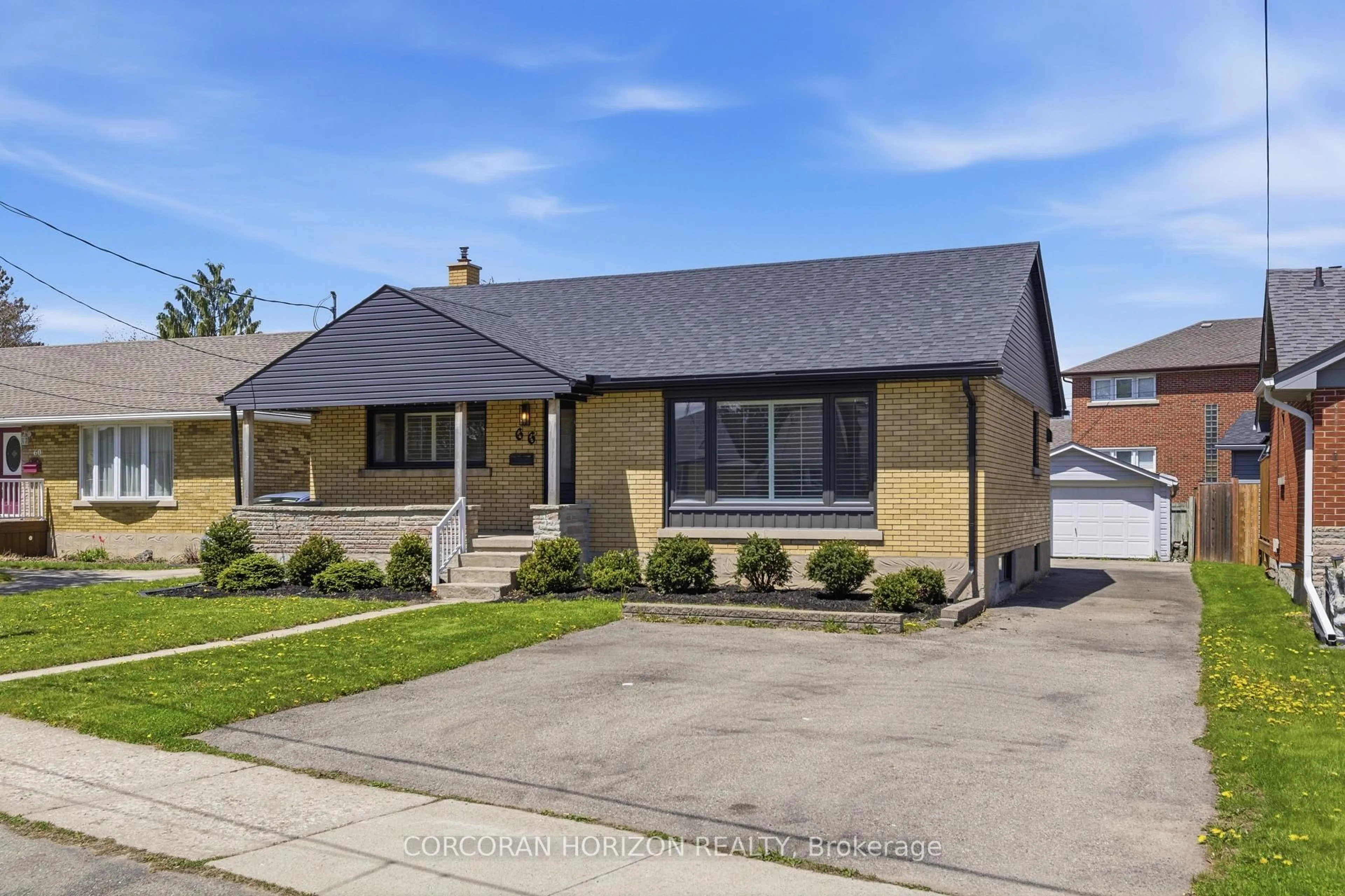 Home with brick exterior material, street for 66 Heather Ave, Kitchener Ontario N2B 1M1