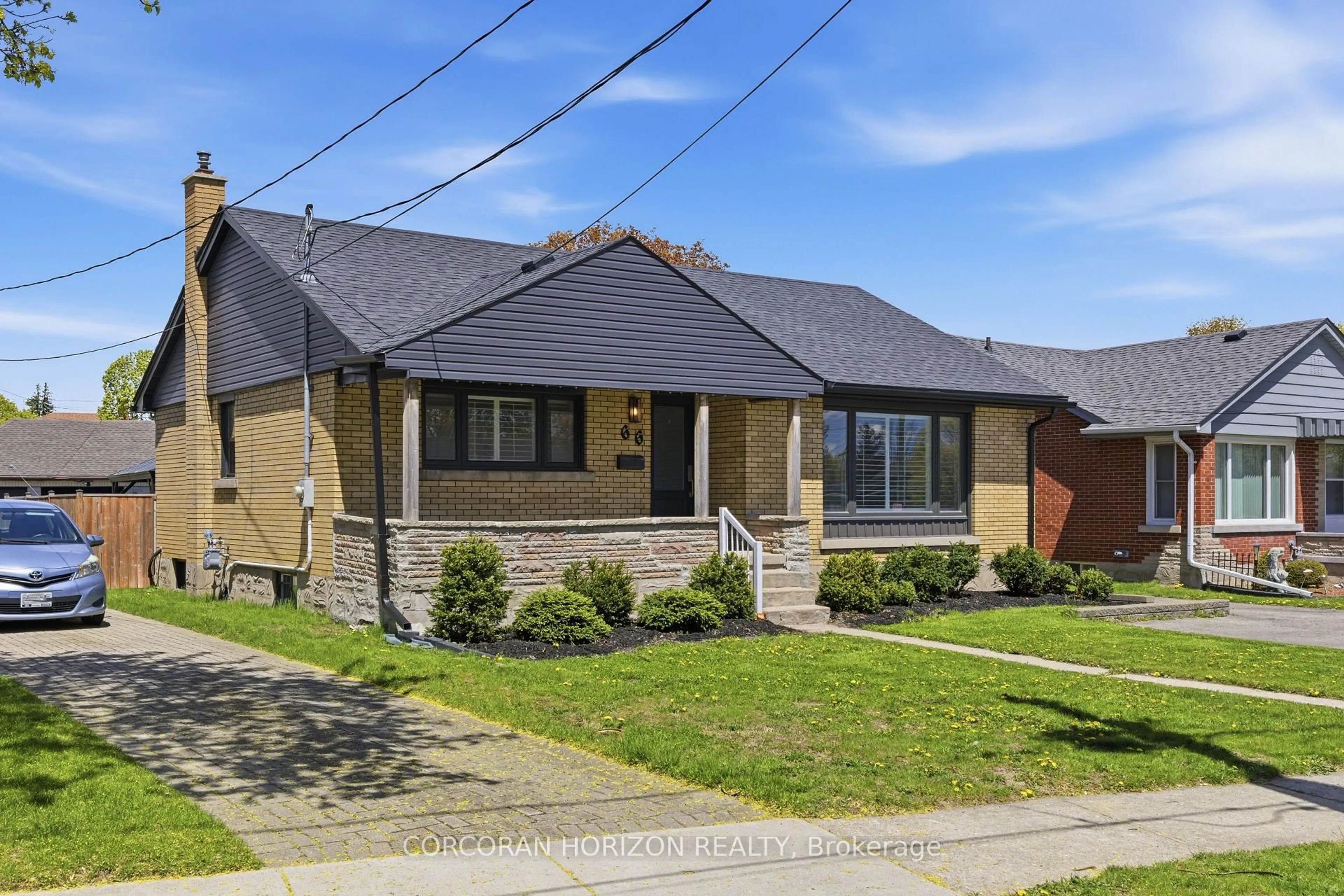 Home with brick exterior material, street for 66 Heather Ave, Kitchener Ontario N2B 1M1