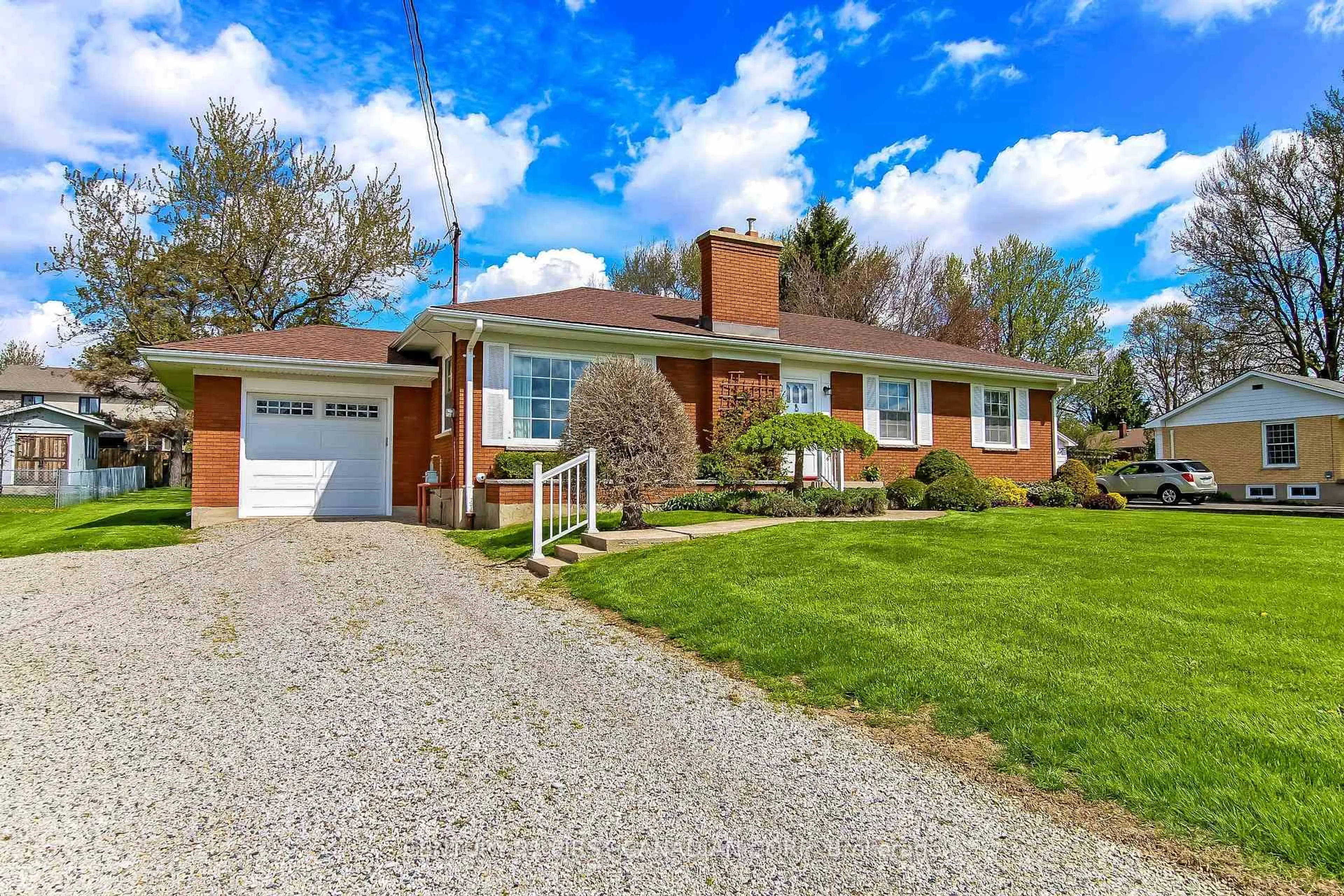 Home with brick exterior material, street for 13340 Ilderton Rd, Middlesex Centre Ontario N0M 2A0