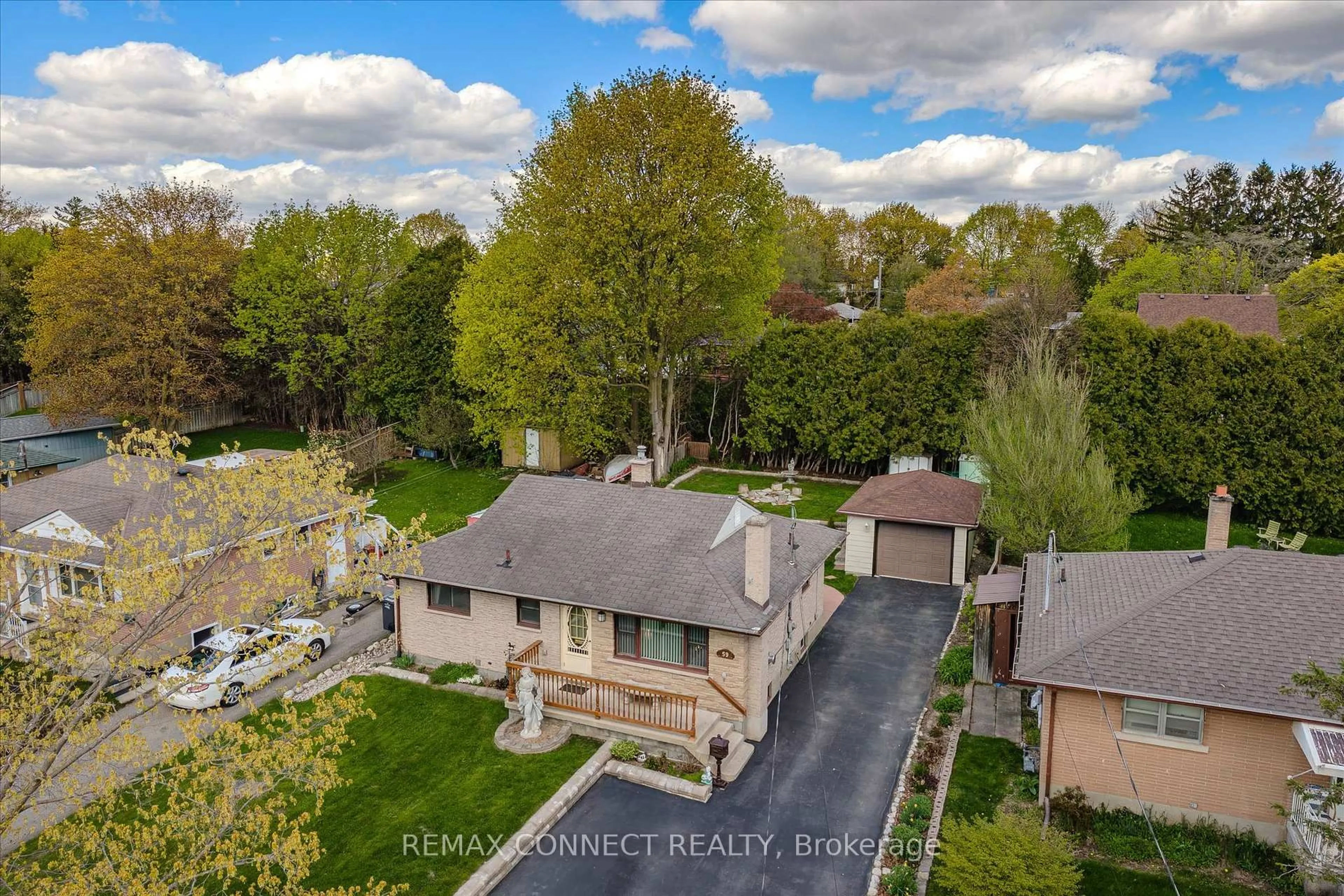 A pic from outside/outdoor area/front of a property/back of a property/a pic from drone, street for 59 Knightswood Blvd, Guelph Ontario N1E 3W6