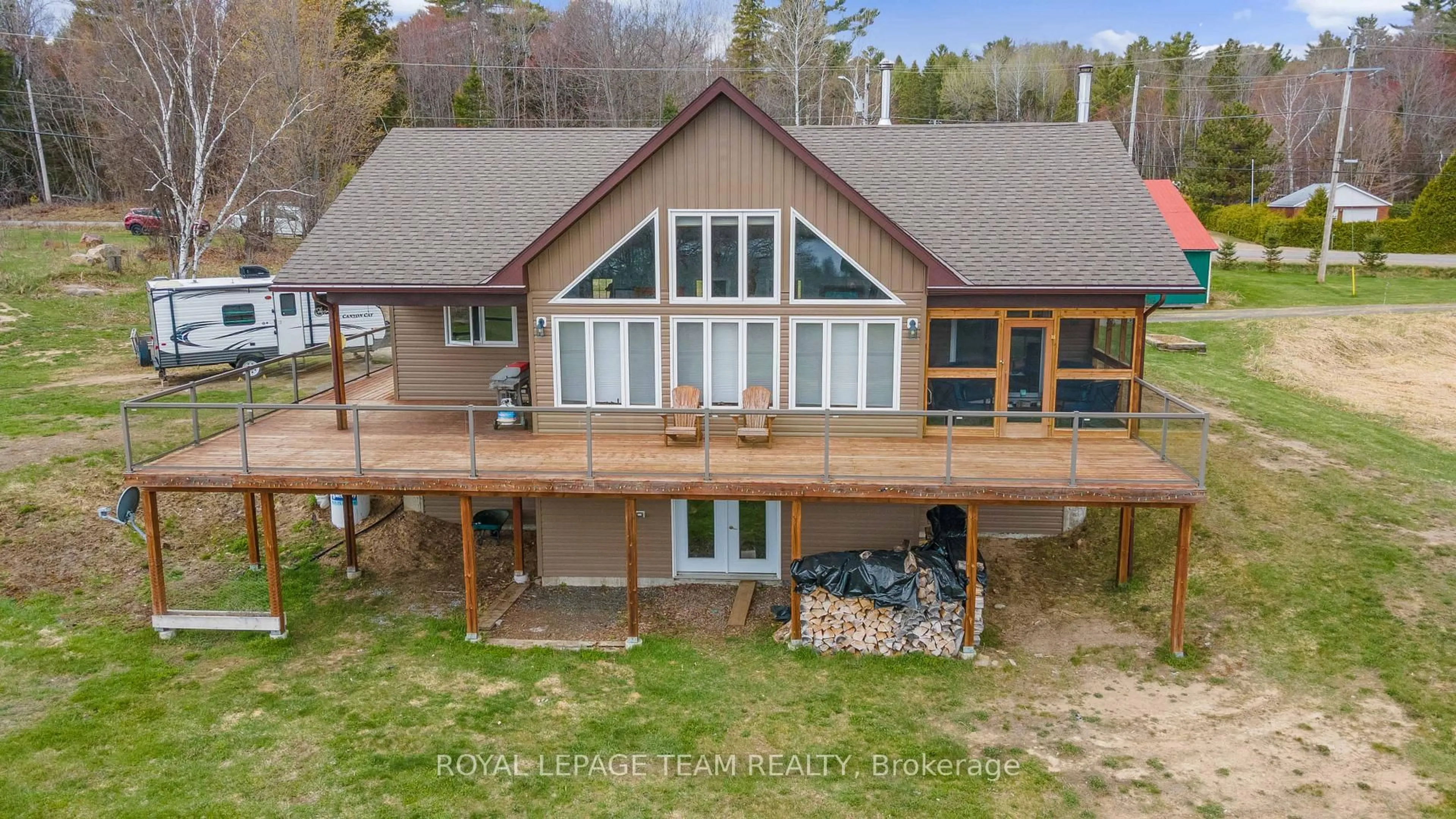 A pic from outside/outdoor area/front of a property/back of a property/a pic from drone, water/lake/river/ocean view for 299 Siberia Rd, Barry's Bay Ontario K0J 1B0