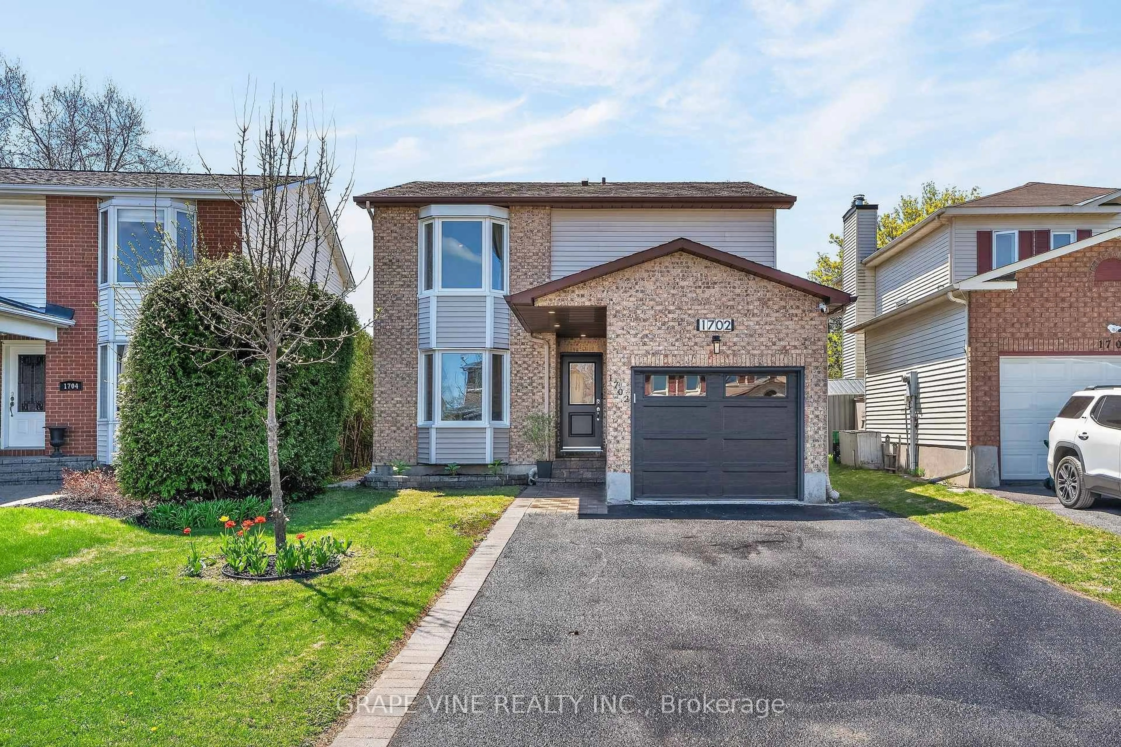 Home with brick exterior material, street for 1702 Boisbriand Cres, Ottawa Ontario K1C 4T9