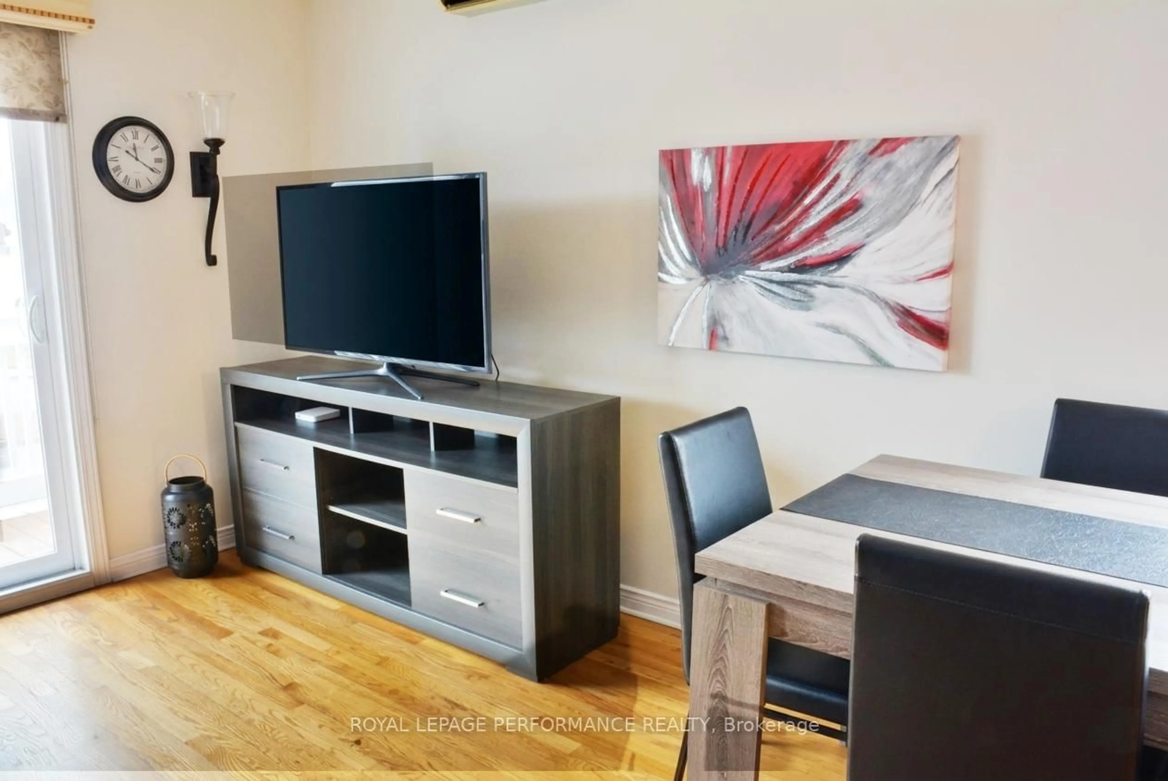 Living room with furniture, wood/laminate floor for 443 Tupper St, Hawkesbury Ontario K6A 3L9