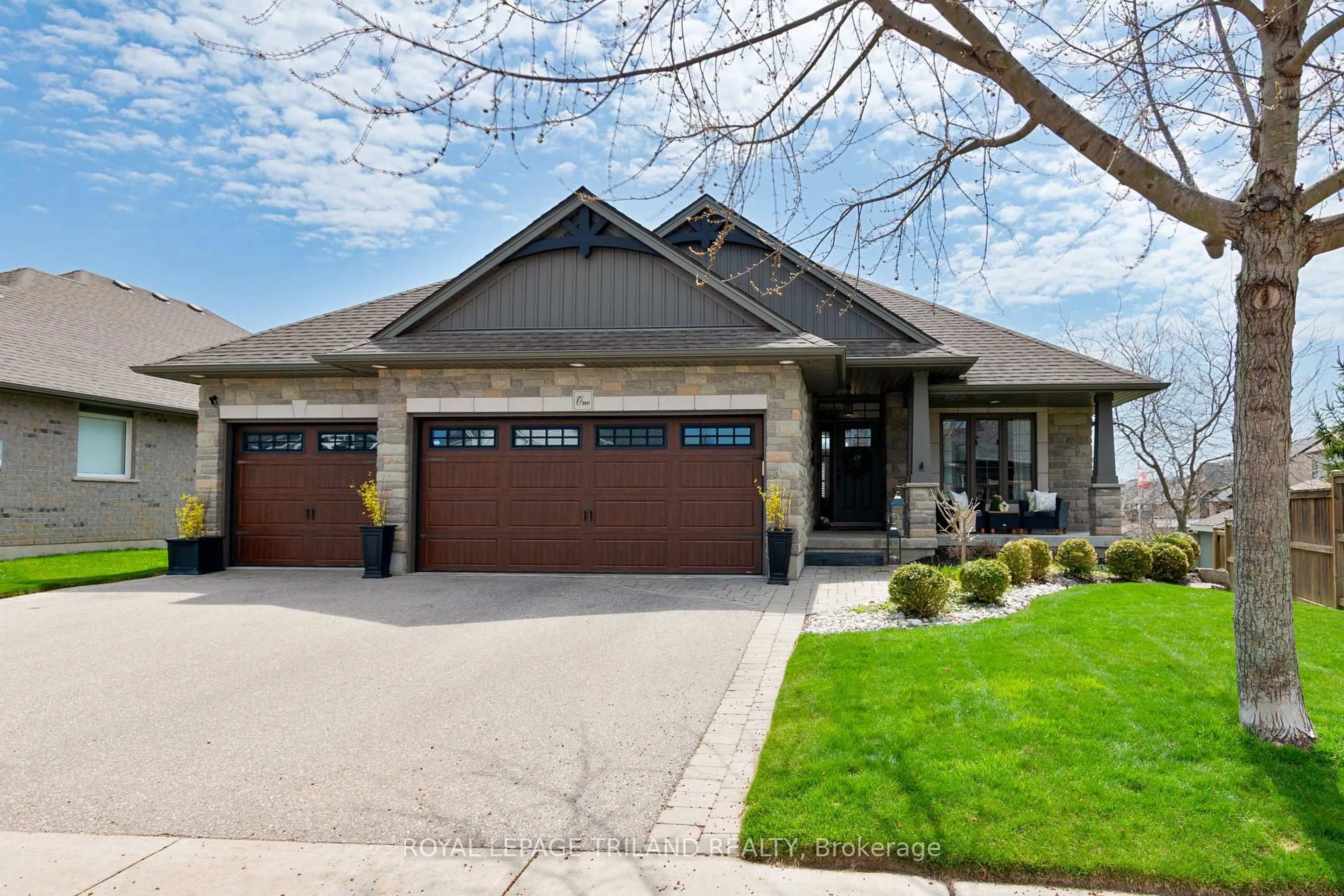 Home with brick exterior material, street for 1 Lincolns Cove St, Central Elgin Ontario N5L 0A8