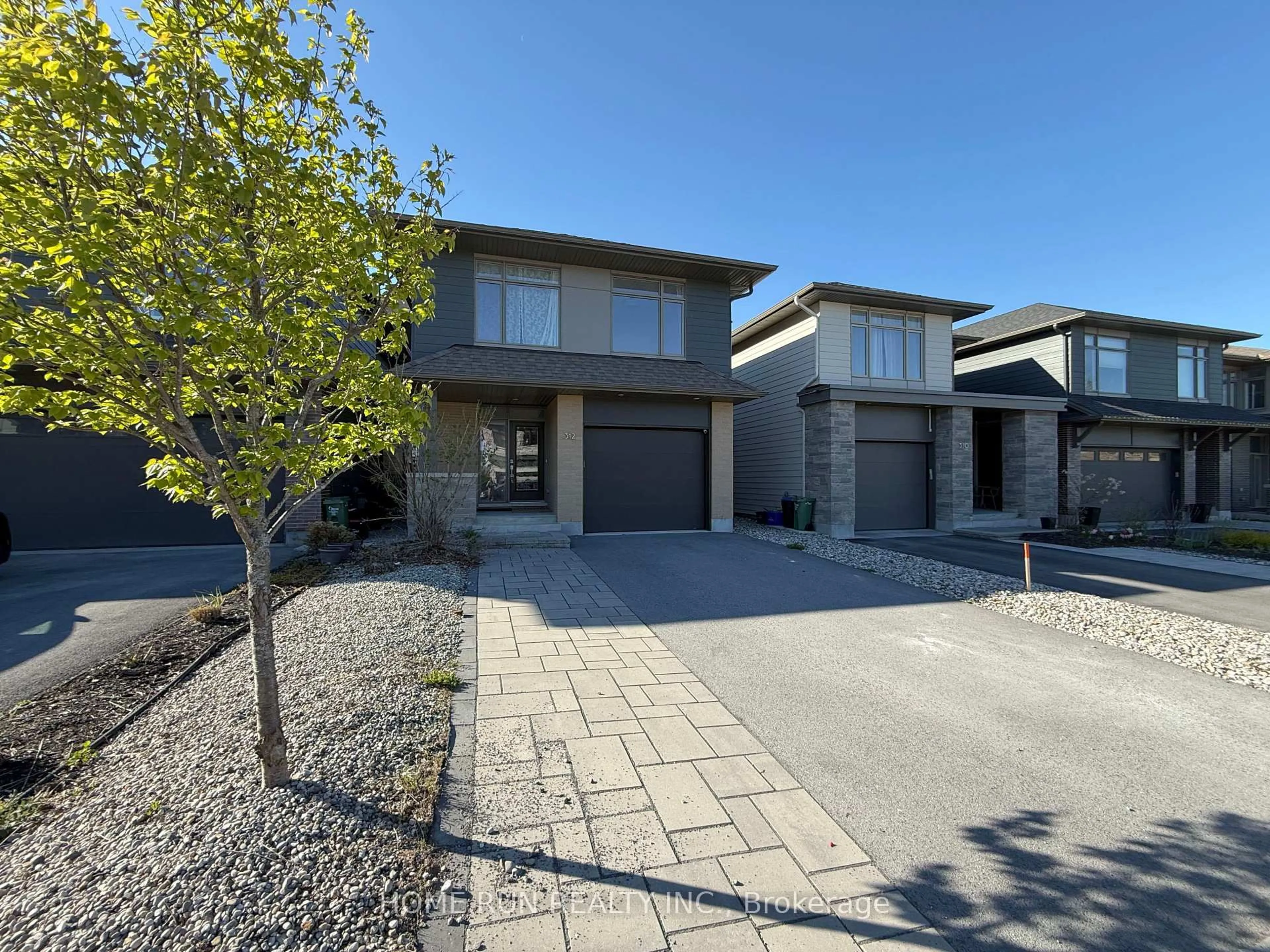 A pic from outside/outdoor area/front of a property/back of a property/a pic from drone, street for 312 Lysander Pl, Ottawa Ontario K1K 4K7