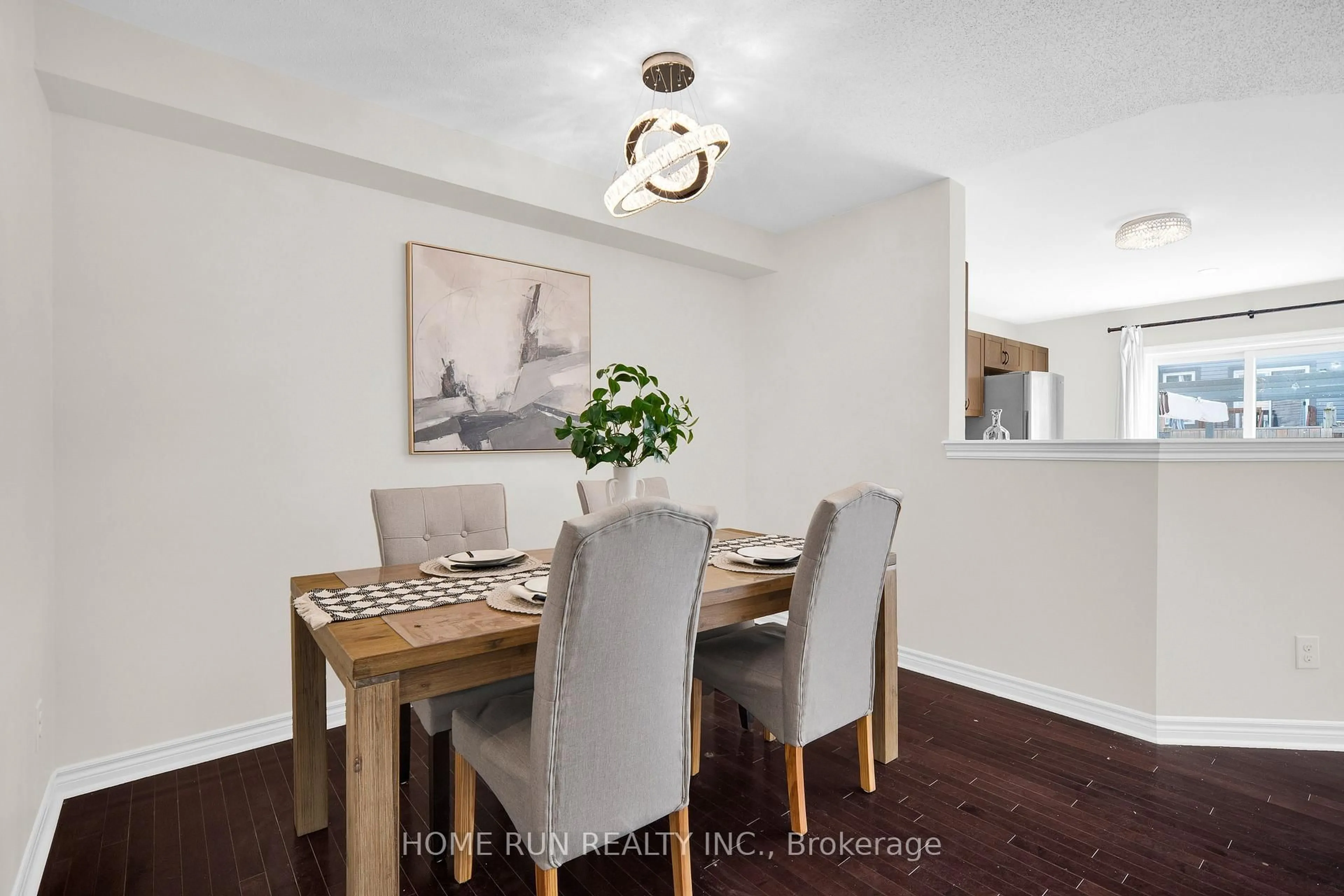 Dining room, wood/laminate floor for 957 Messor Cres, Ottawa Ontario K2S 0P2