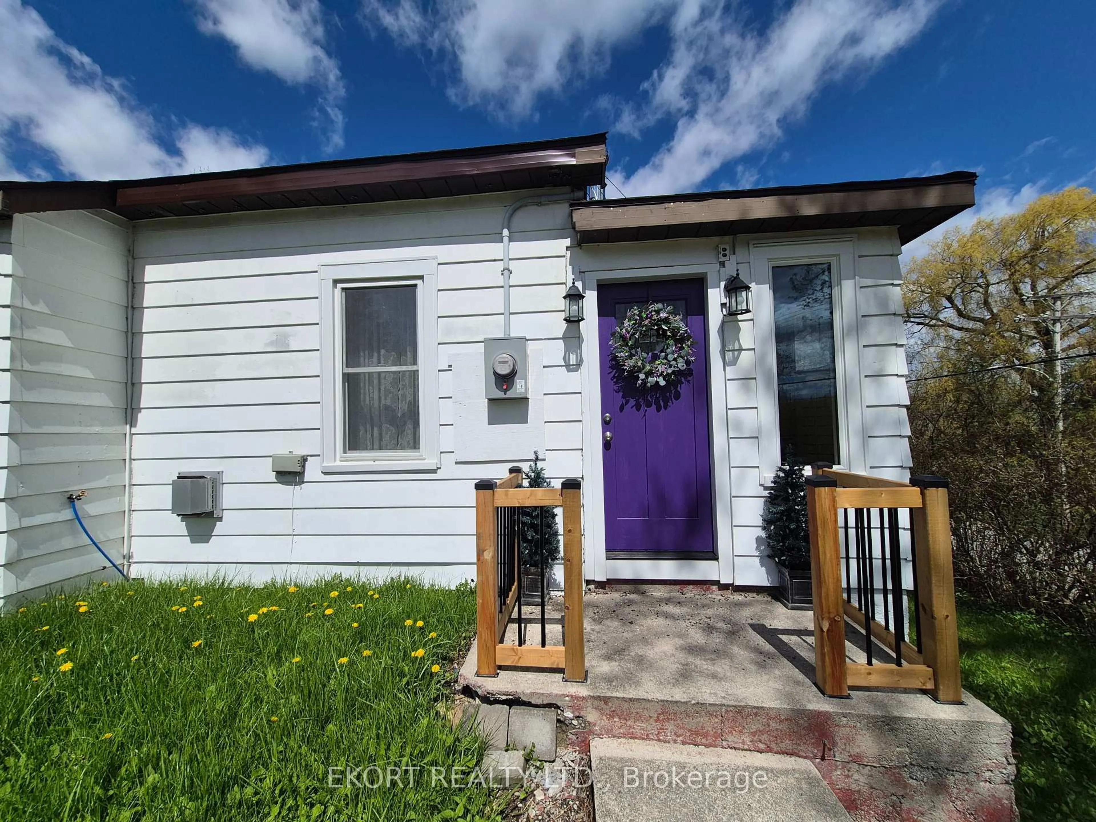 Home with vinyl exterior material, street for 101 Barley Rd, Prince Edward County Ontario K0K 1L0