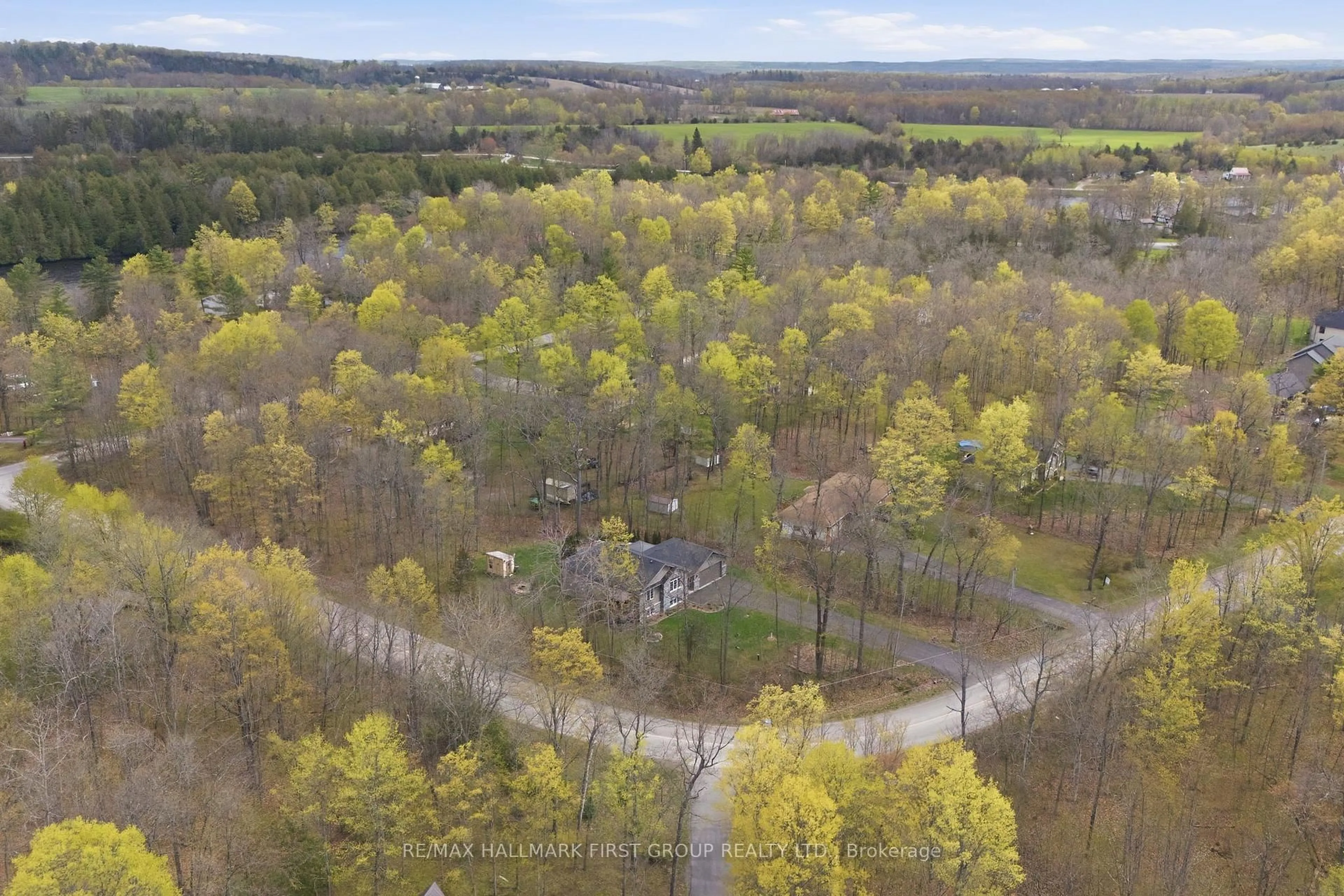A pic from outside/outdoor area/front of a property/back of a property/a pic from drone, forest/trees view for 29 Riverside Dr, Trent Hills Ontario K0L 1L0