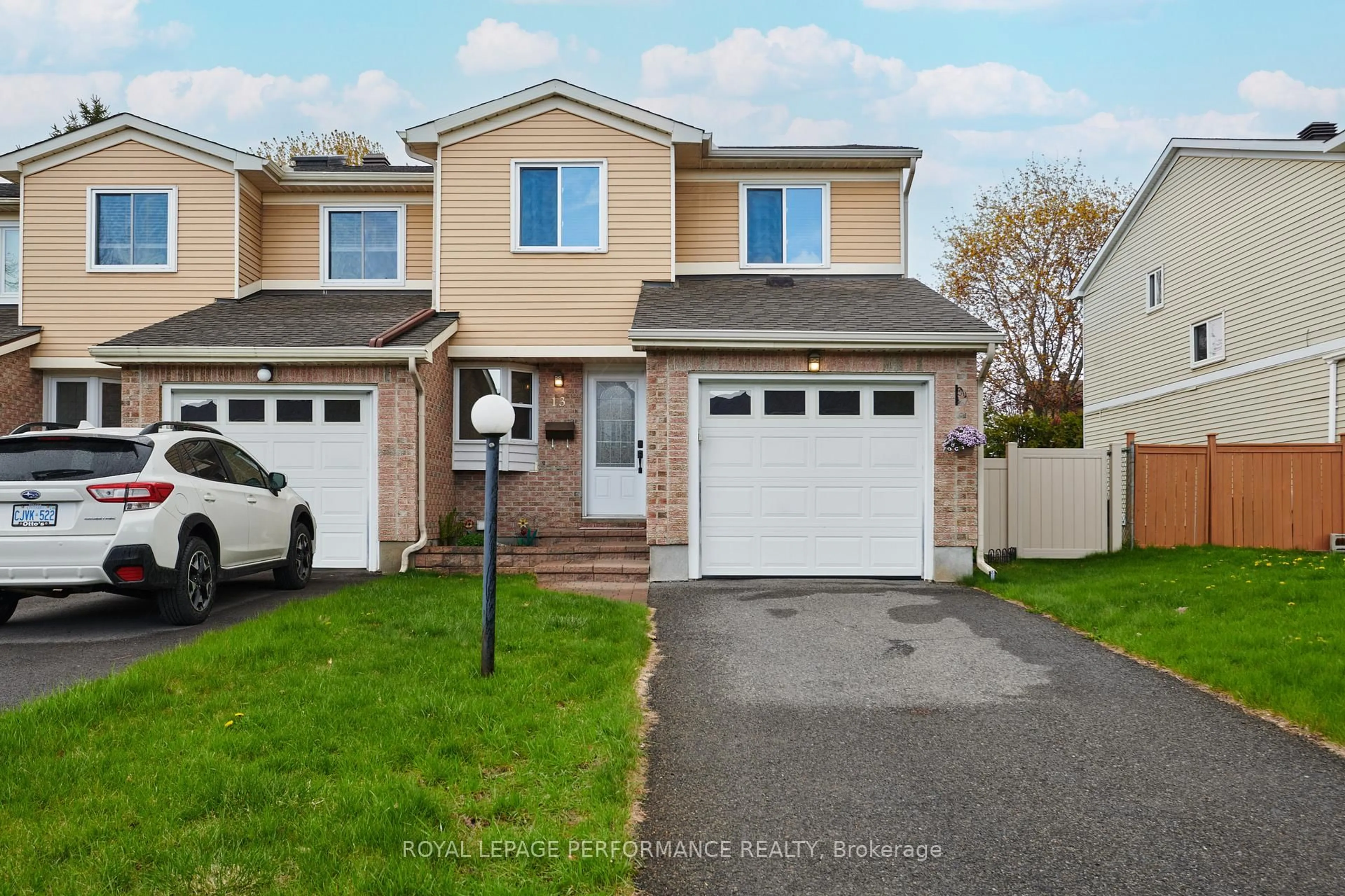 Home with vinyl exterior material, street for 13 Shadetree Cres, Ottawa Ontario K2E 7R3