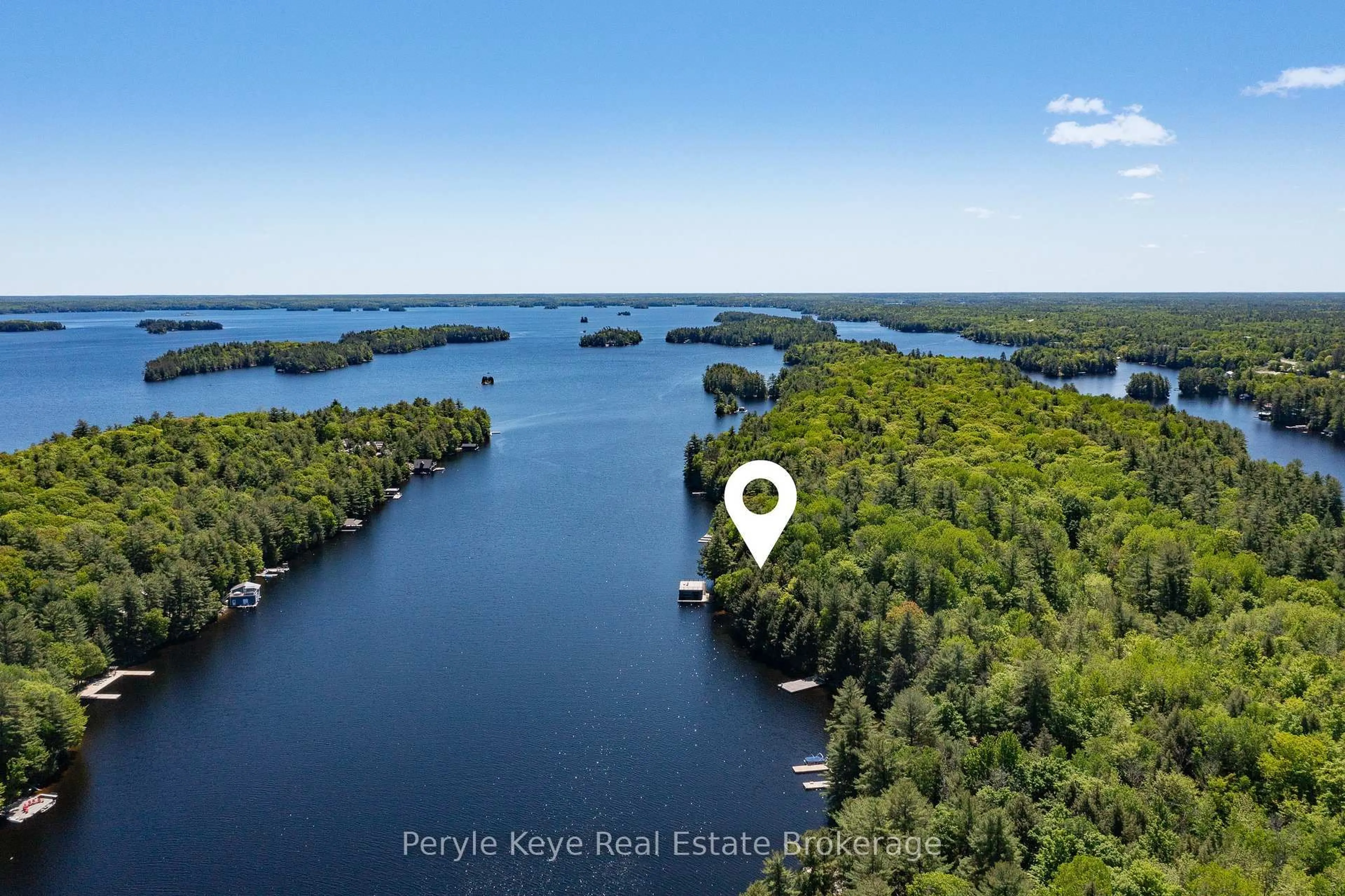 A pic from outside/outdoor area/front of a property/back of a property/a pic from drone, water/lake/river/ocean view for 22-26 Taylor Island, Gravenhurst Ontario P1P 1R2