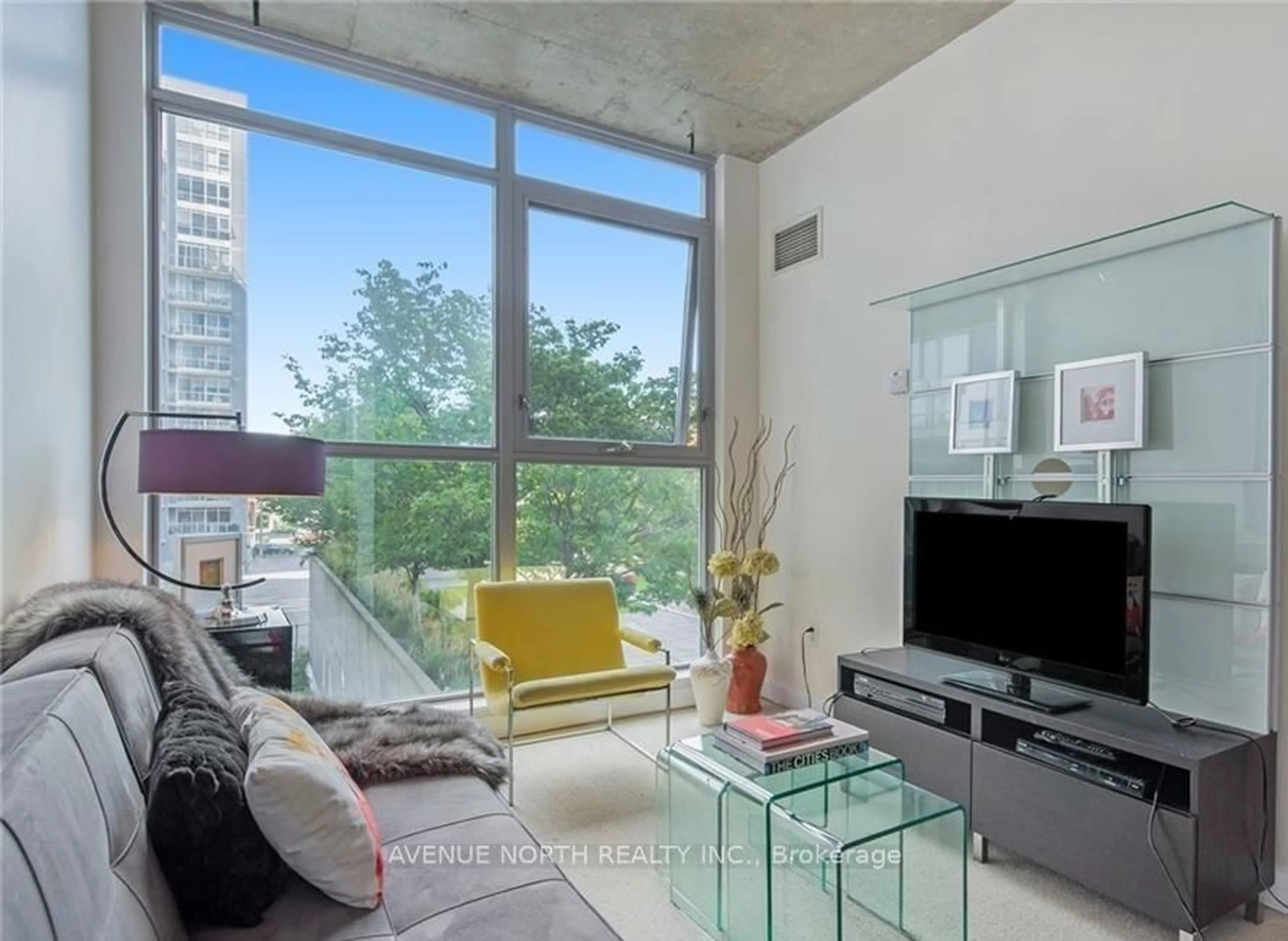 Living room with furniture, cement floor for 179 George St #301, Ottawa Ontario K1N 1J8