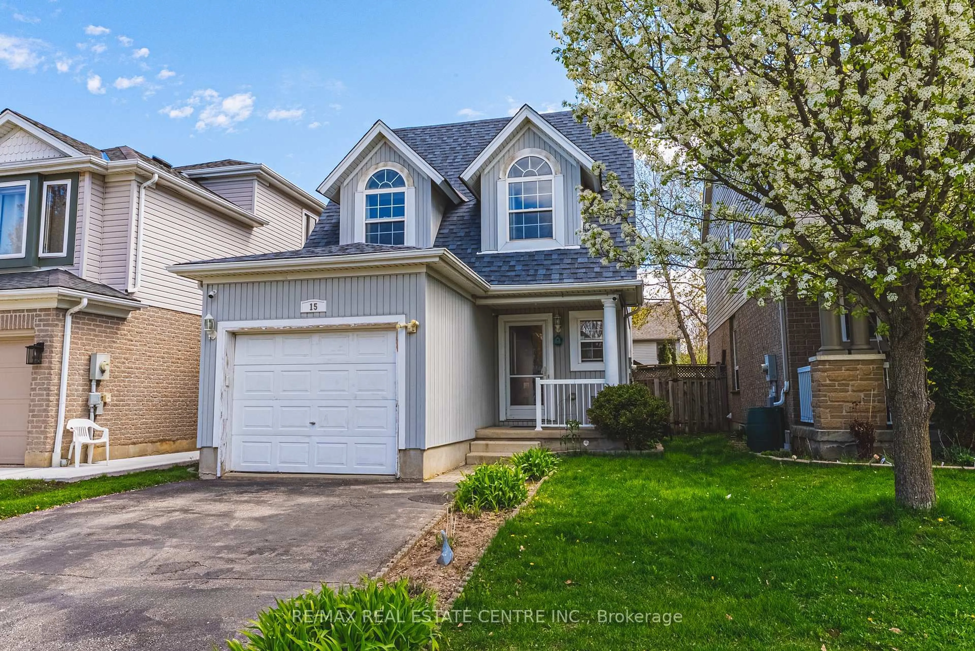 Home with vinyl exterior material, street for 15 Lardner St, Cambridge Ontario N3C 4K6