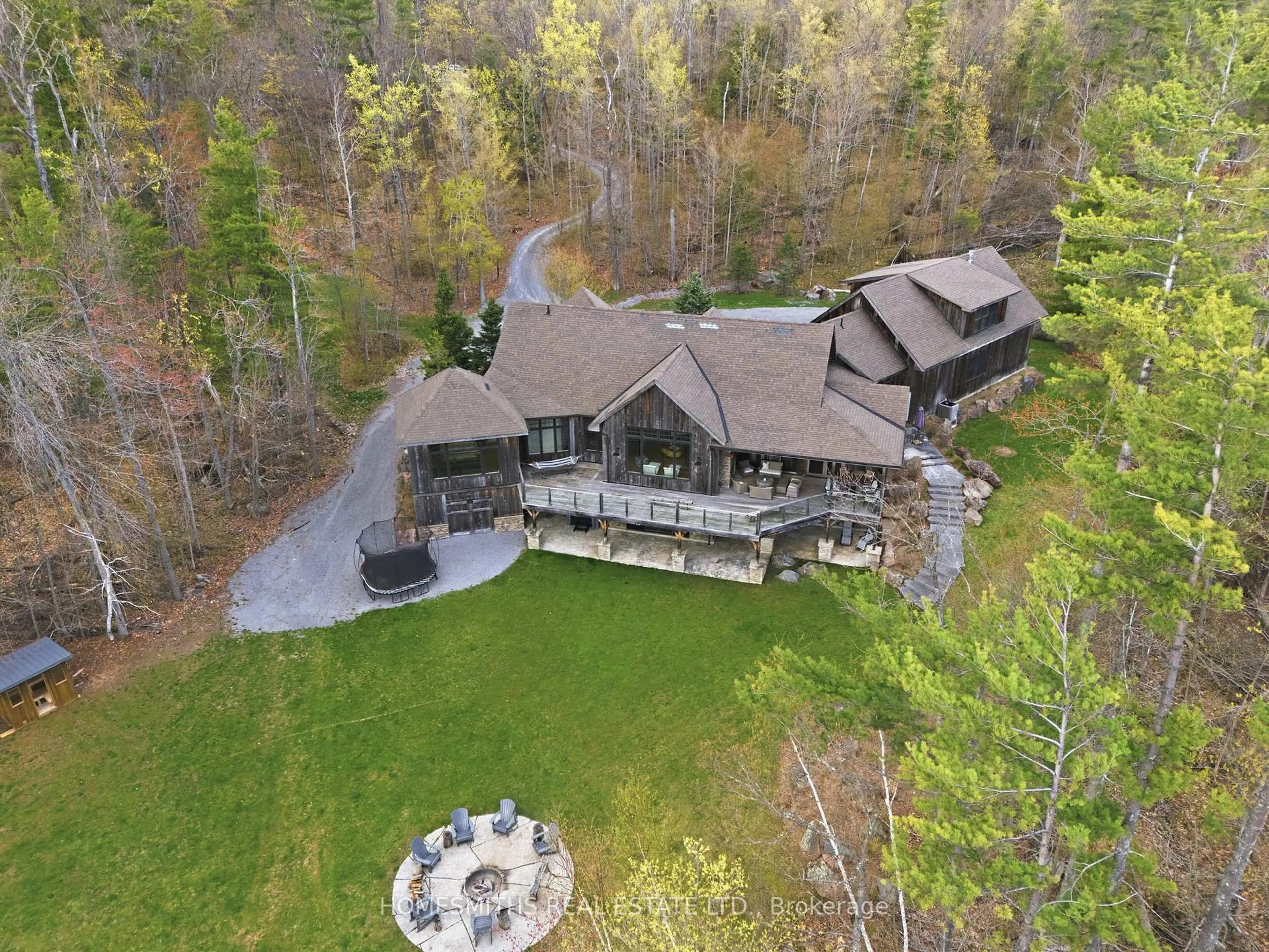 A pic from outside/outdoor area/front of a property/back of a property/a pic from drone, unknown for 135 Fire 10e Rte, North Kawartha Ontario K0L 1A0