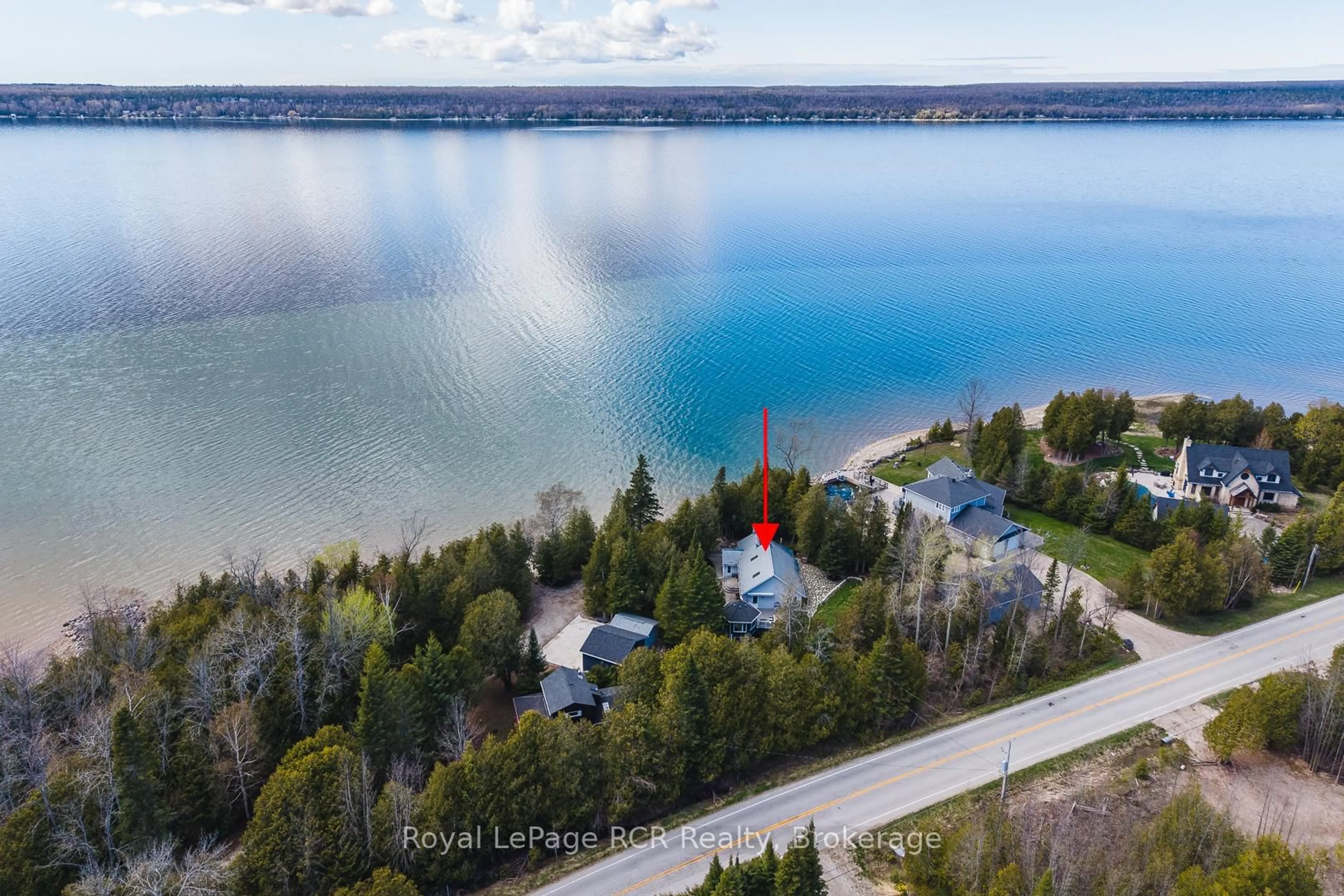 A pic from outside/outdoor area/front of a property/back of a property/a pic from drone, water/lake/river/ocean view for 502183 Grey Road 1 Rd, Georgian Bluffs Ontario N0H 2T0