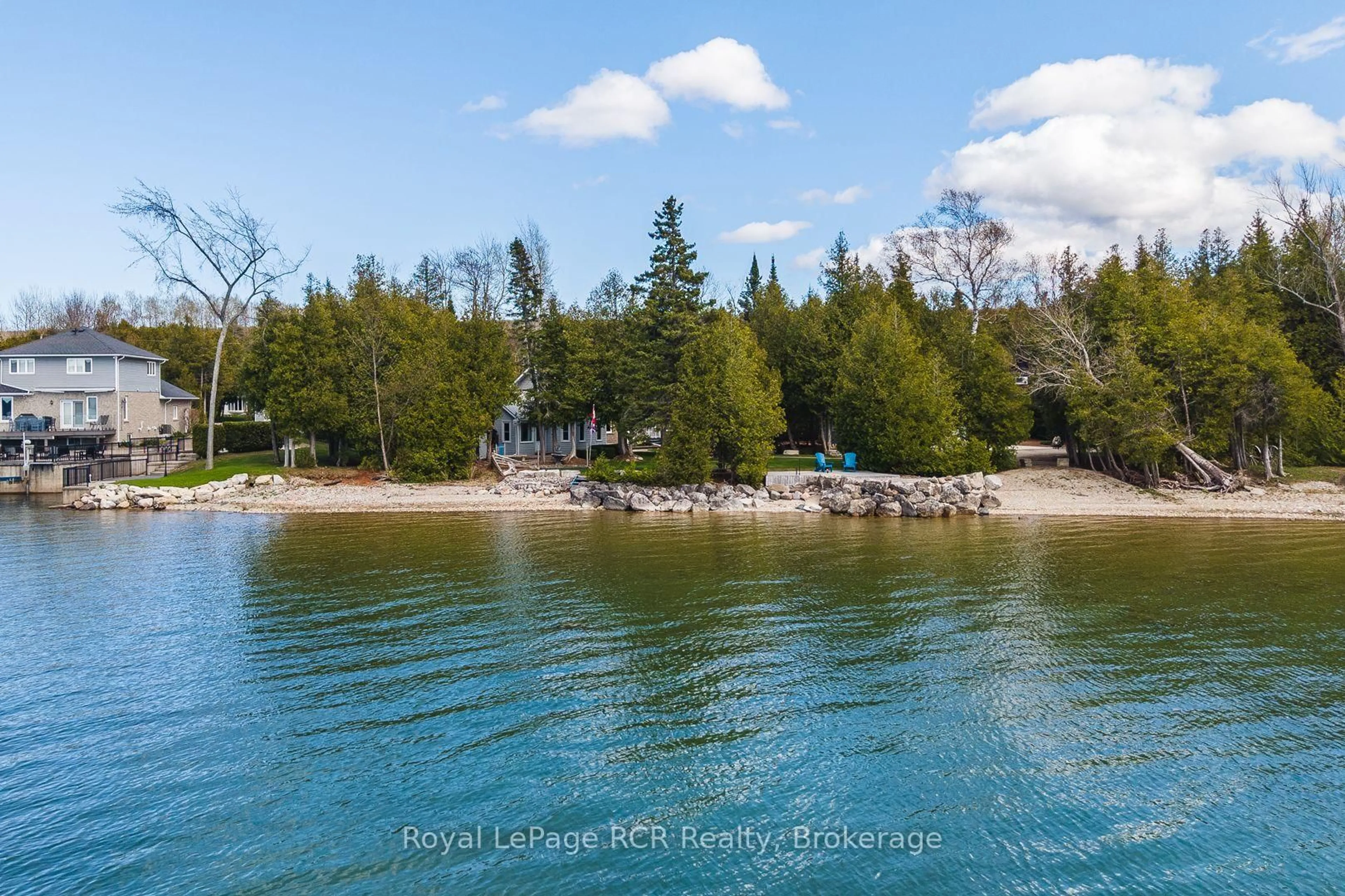 A pic from outside/outdoor area/front of a property/back of a property/a pic from drone, water/lake/river/ocean view for 502183 Grey Road 1 Rd, Georgian Bluffs Ontario N0H 2T0