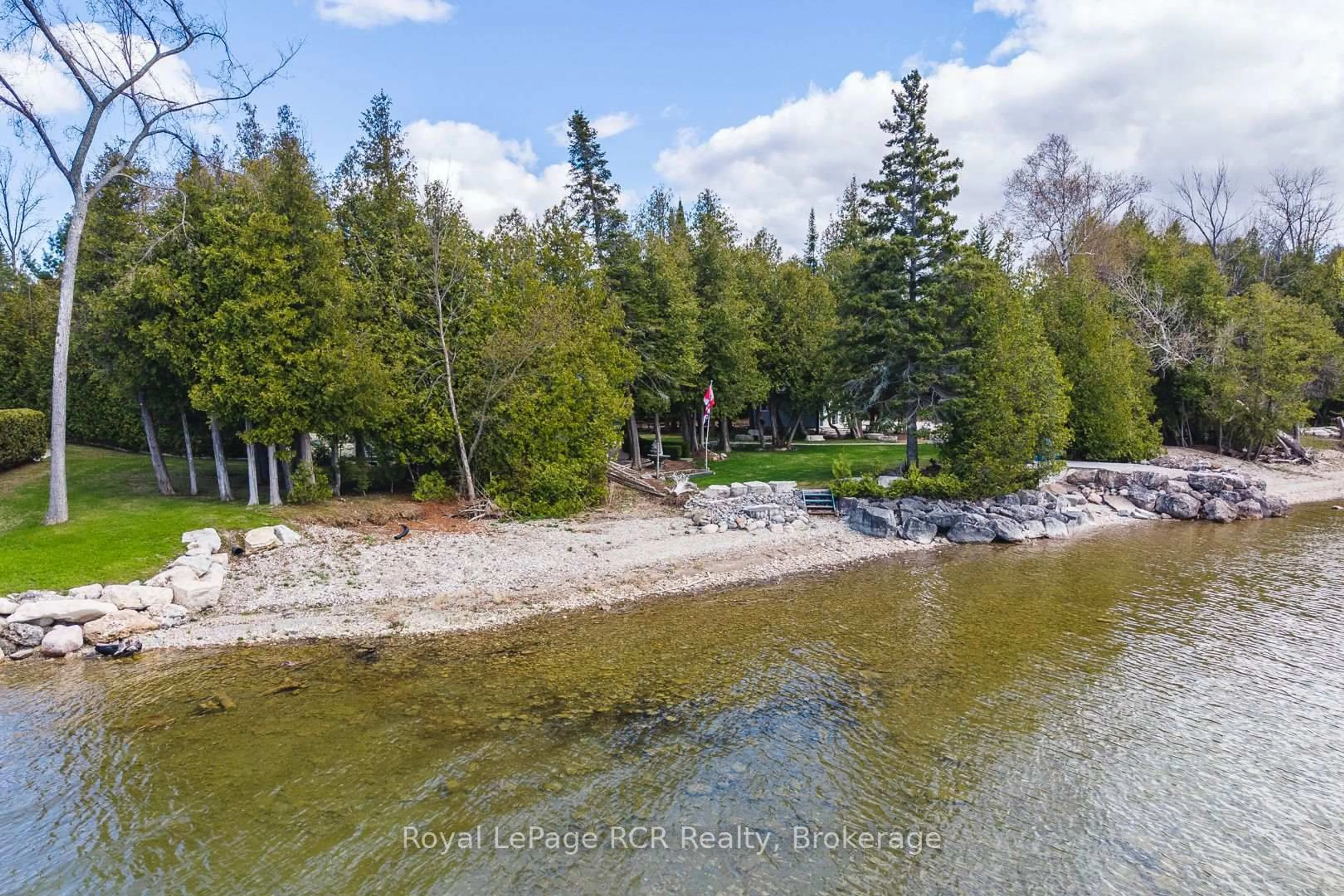 A pic from outside/outdoor area/front of a property/back of a property/a pic from drone, water/lake/river/ocean view for 502183 Grey Road 1 Rd, Georgian Bluffs Ontario N0H 2T0